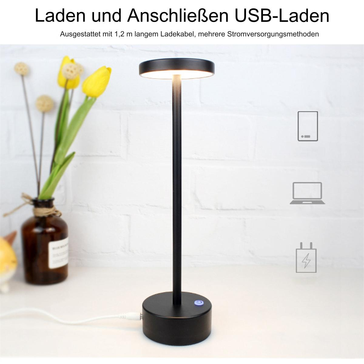 Schwarze Schreibtischlampe mit beleuchtetem kreisförmigen Kopf. Ein weißes USB-Kabel ist angeschlossen. Minimalistischer Stil.