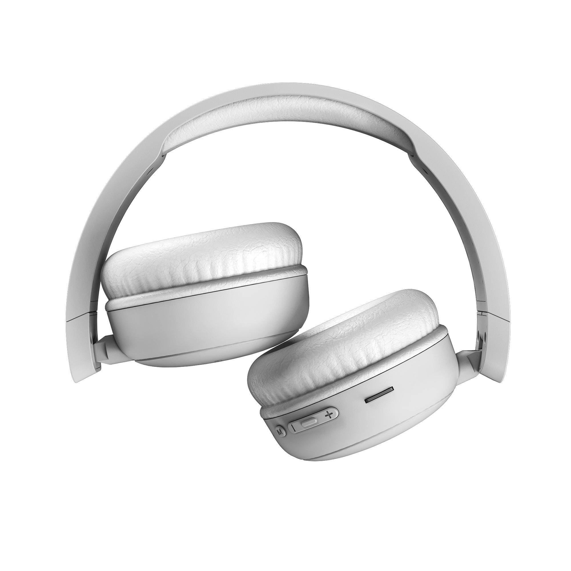 Auriculares blancos plegados, mostrando almohadillas y diadema.