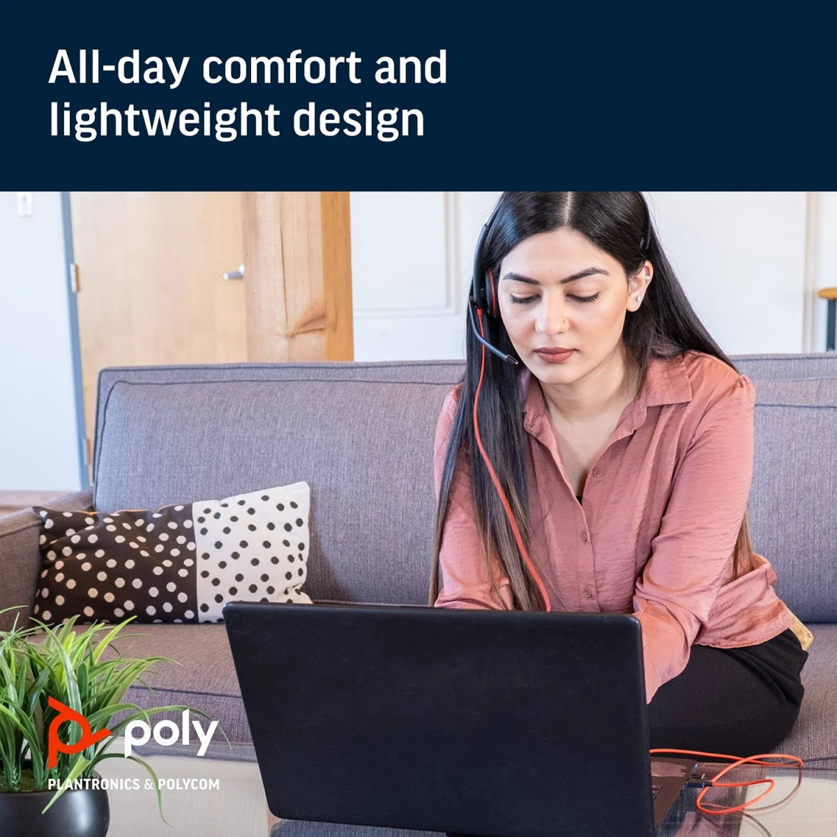 Woman using a laptop with a headset on a grey sofa. Text says 'All-day comfort and lightweight design'.