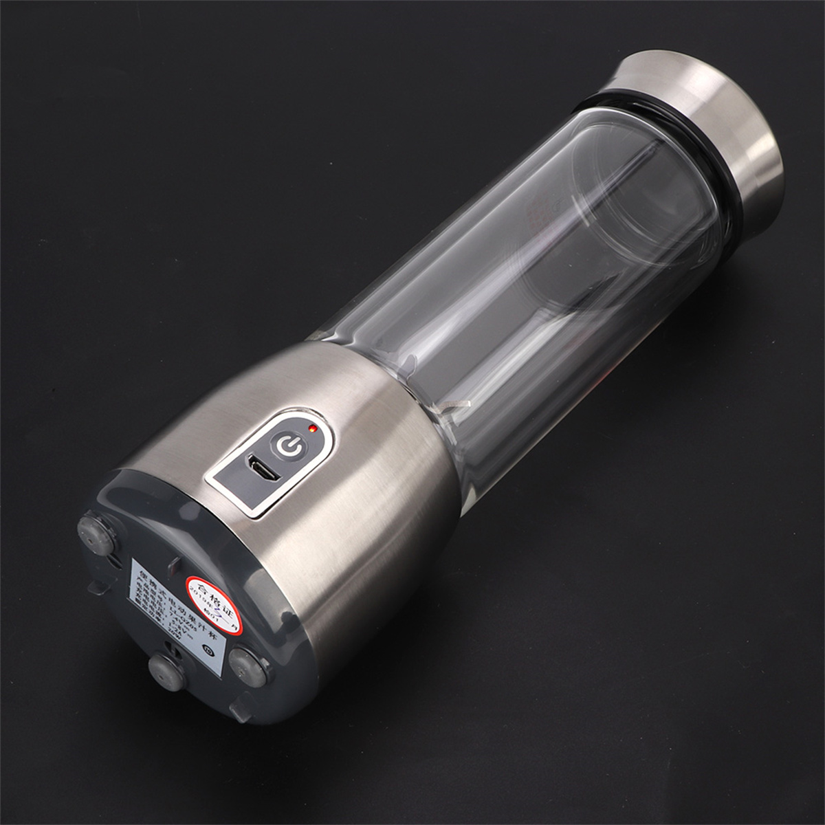Silberne und transparente Wasserflasche mit Power-Taste und Betriebsanzeige.
