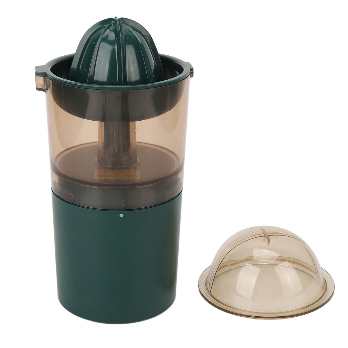 Grüner und brauner Zitruspresse mit separater Kuppelabdeckung.
