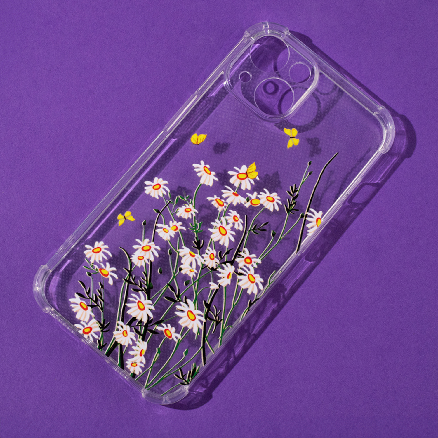 Transparente Handyhülle mit Gänseblümchen und gelben Schmetterlingen auf lila Hintergrund.