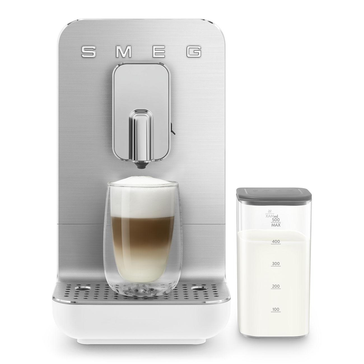 Silver SMEG coffee machine with a glass of latte and a milk container beside it.