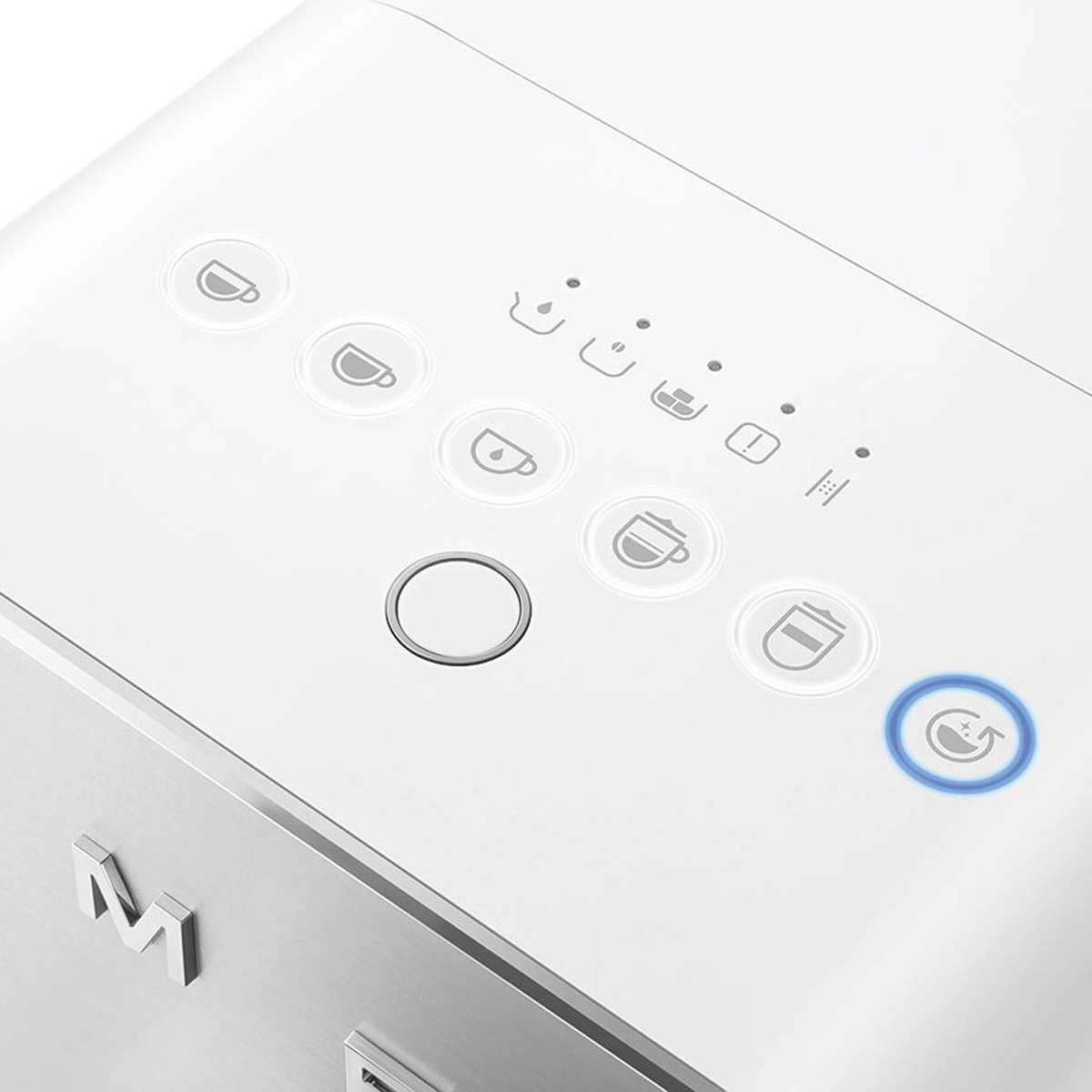 Close-up of a white coffee machine control panel with buttons and lights. A metal 'M' is visible.