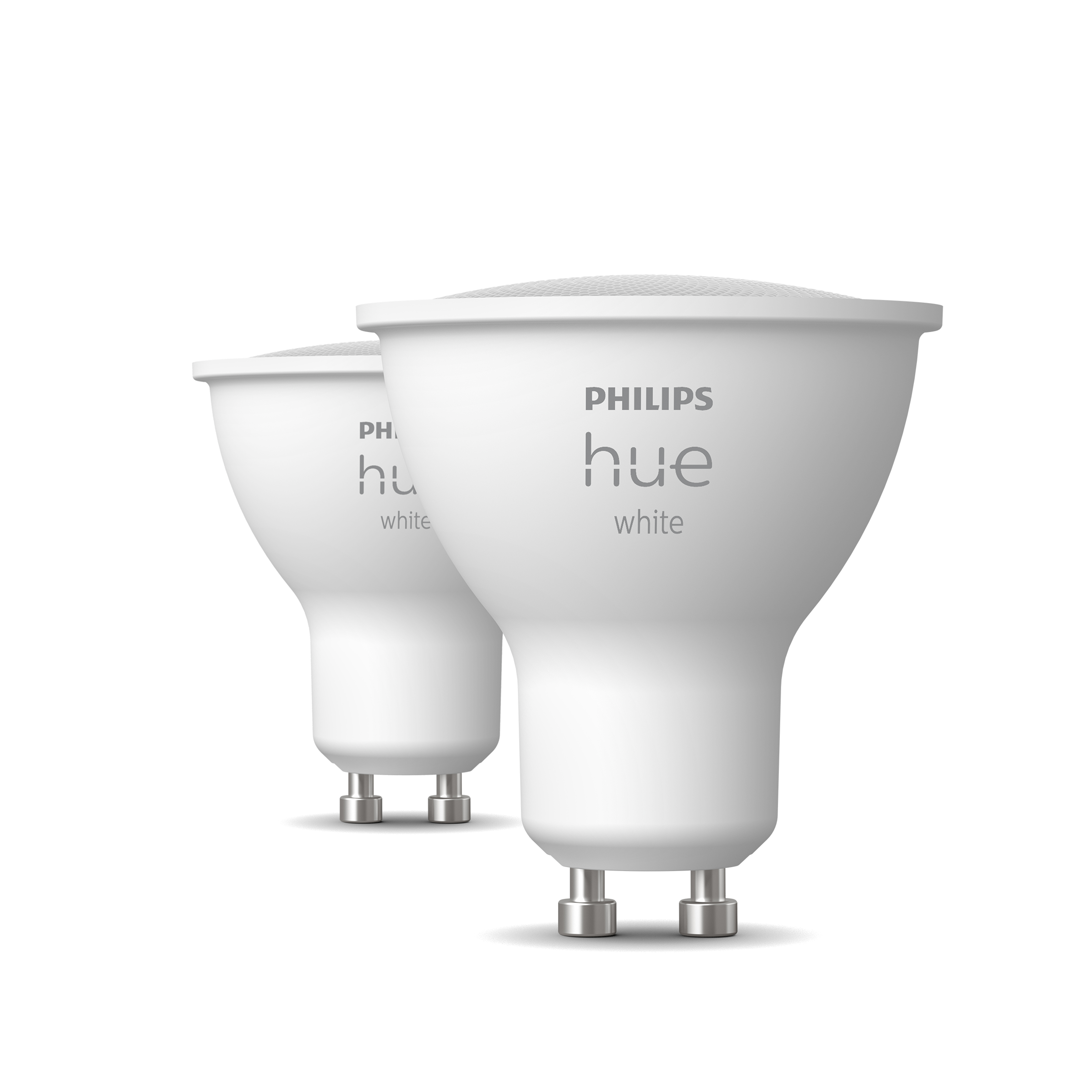 Dwie białe żarówki Philips Hue white. Są na białym tle.