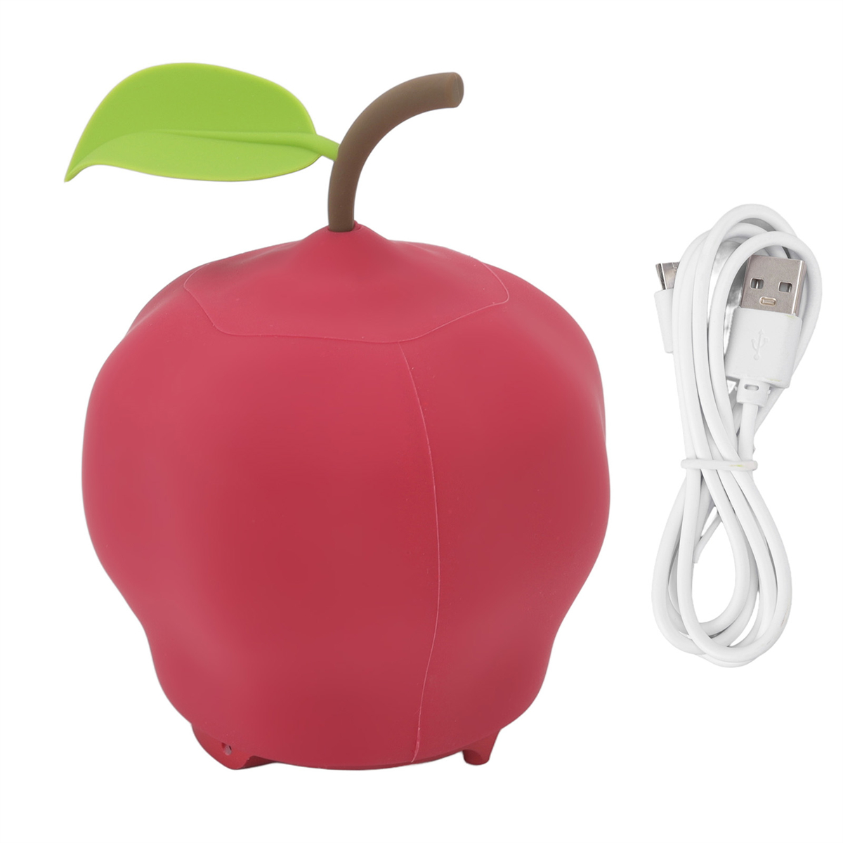 Eine rote, apfelförmige Lampe mit einem grünen Blatt und einem weißen USB-Kabel daneben.