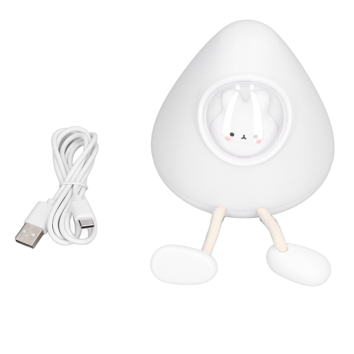 Weißes eiförmiges Nachtlicht mit Hasengesicht, Füßen und USB-Kabel.