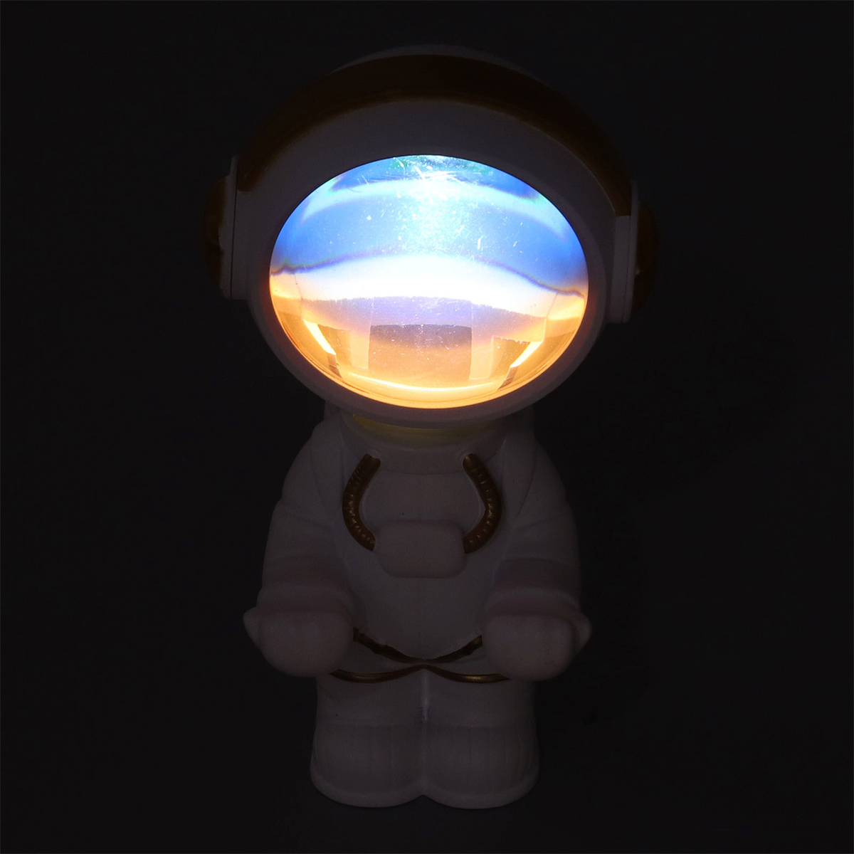 Eine weiße Astronautenlampe mit blauem und orangefarbenem Leuchten.
