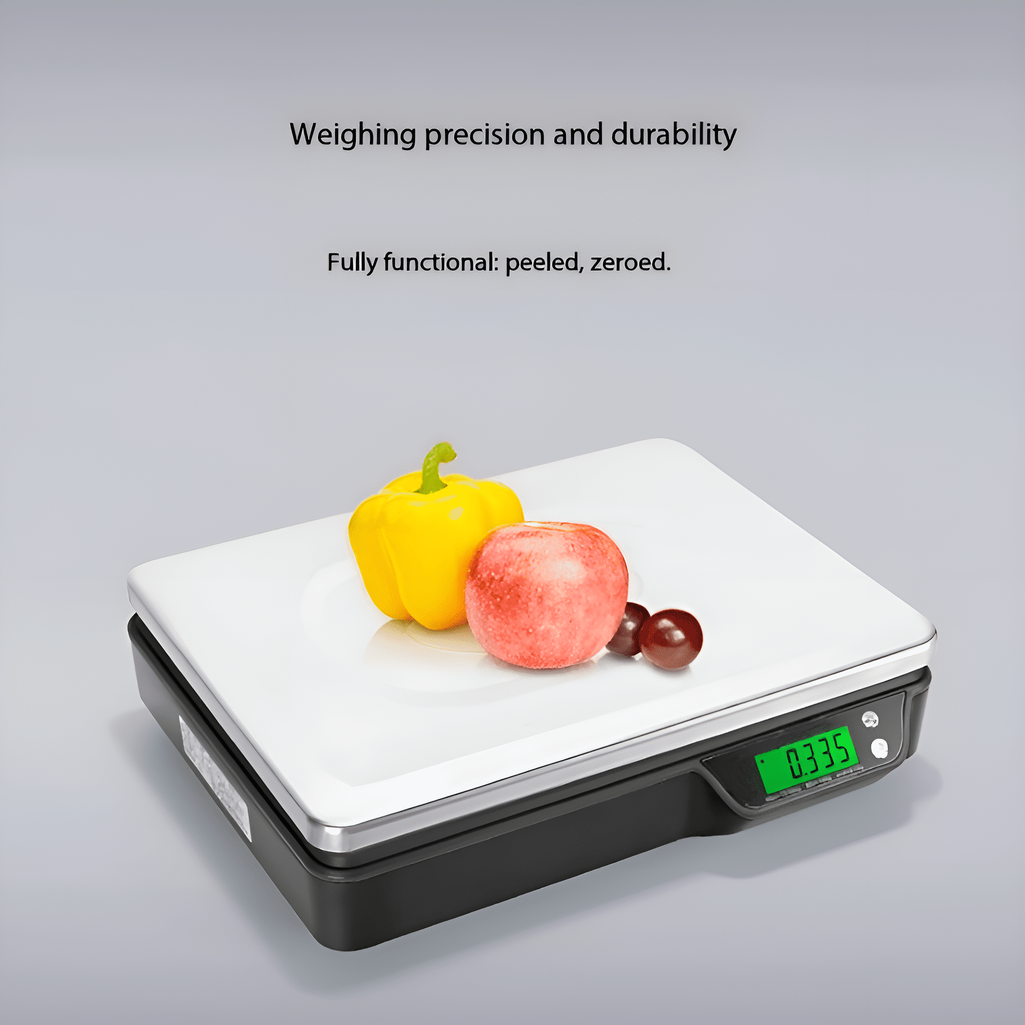 Eine weiße Digitalwaage mit gelbem Paprika, rotem Apfel und Trauben.