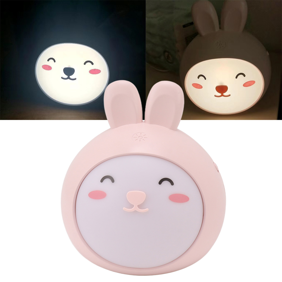 Ein hasenförmiges Nachtlicht. Es hat ein lächelndes Gesicht und ist rosa. Das Licht scheint aus dem Gesicht.
