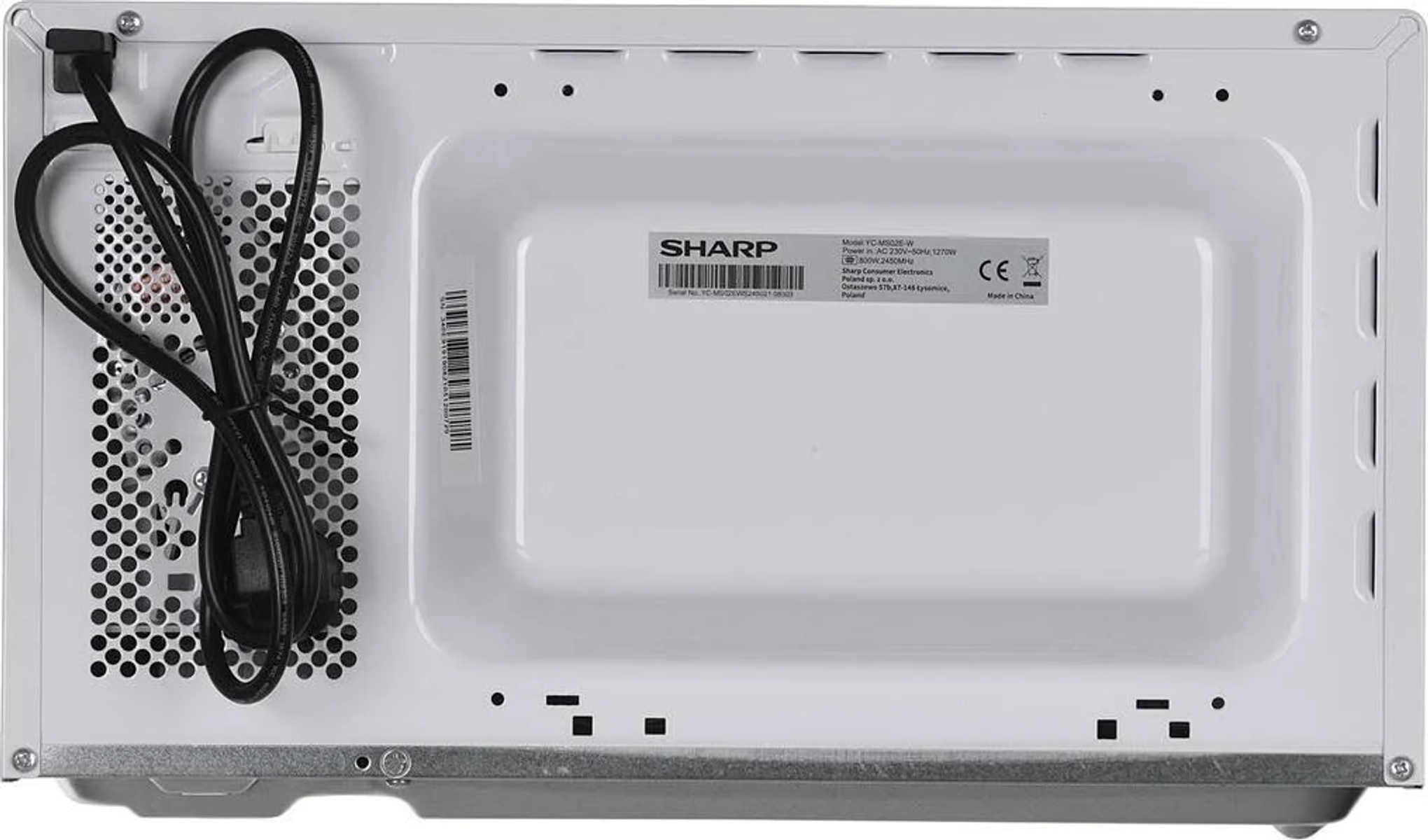 Tył białej kuchenki mikrofalowej z widocznym otworem wentylacyjnym i przewodem zasilającym. Wnętrze jest białe.