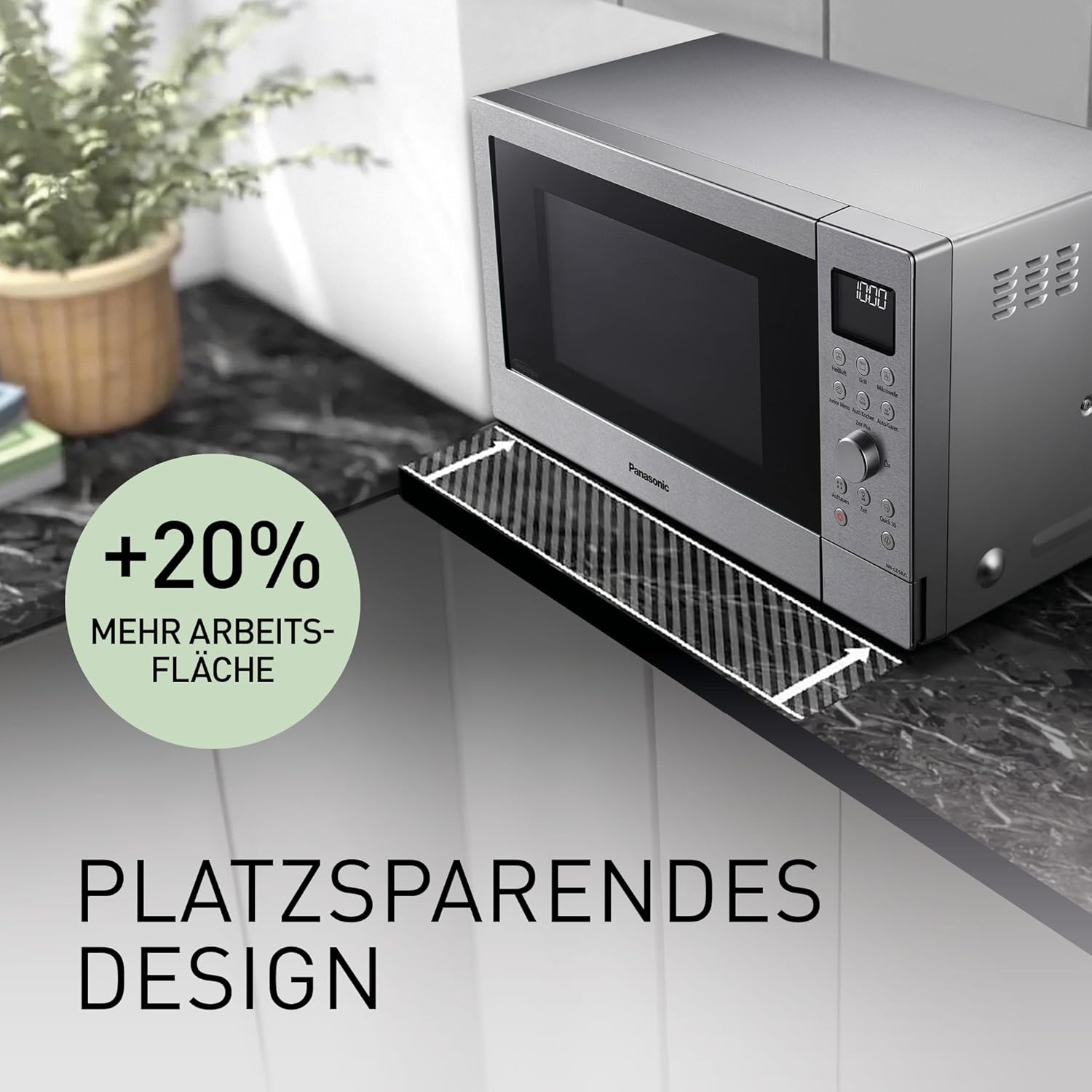 Kuchenka mikrofalowa na blacie z czarną powierzchnią. Tekst: +20% mehr Arbeitsfläche.