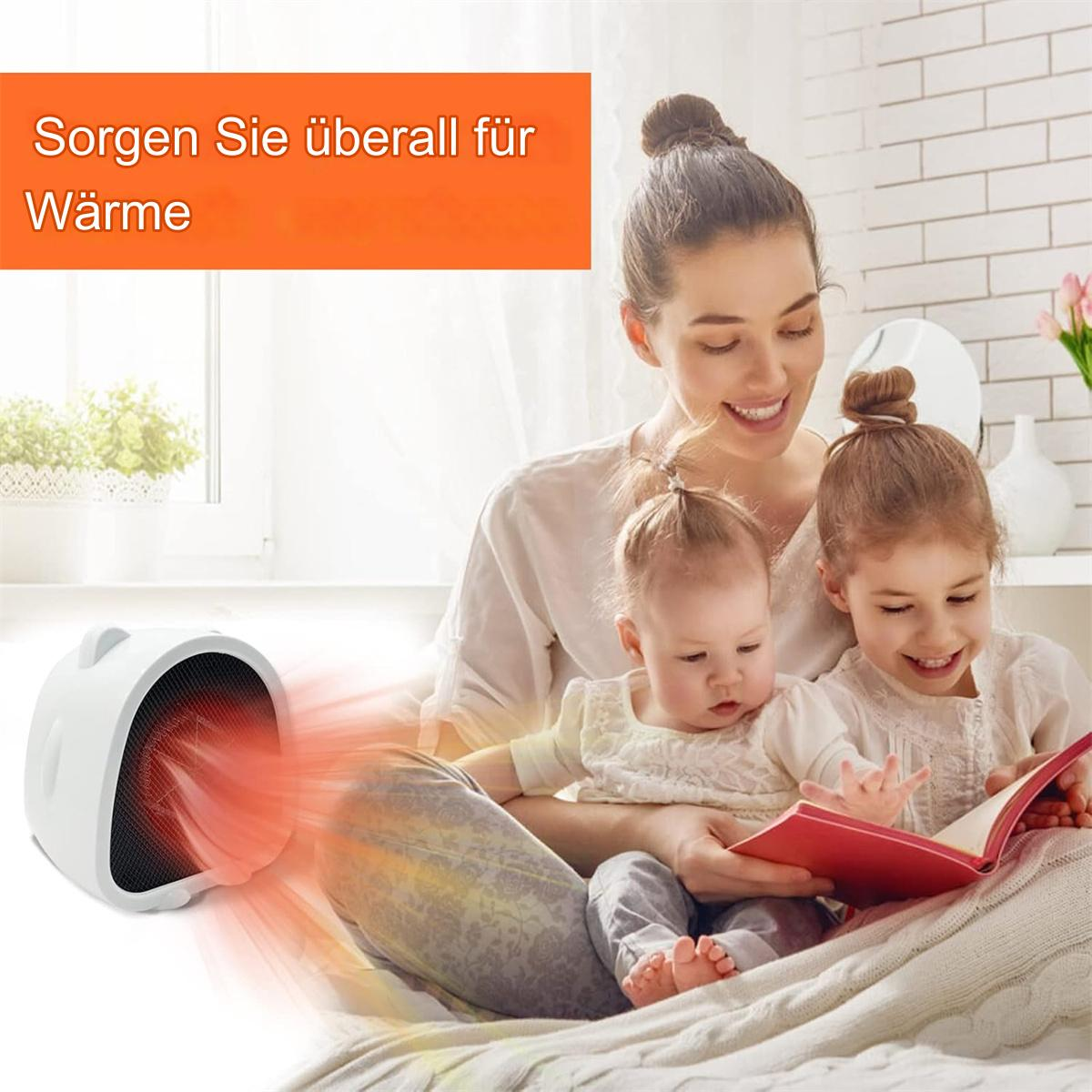 Eine Familie genießt Wärme. Eine Mutter liest zwei Kindern in der Nähe eines weißen Heizlüfters vor.