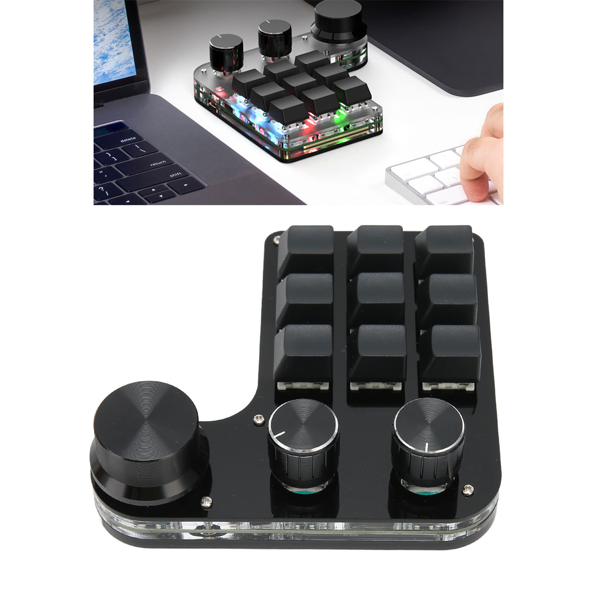 Ein schwarzer Controller mit Knöpfen und Tasten für einen Computer, neben einem Laptop und einer Tastatur.
