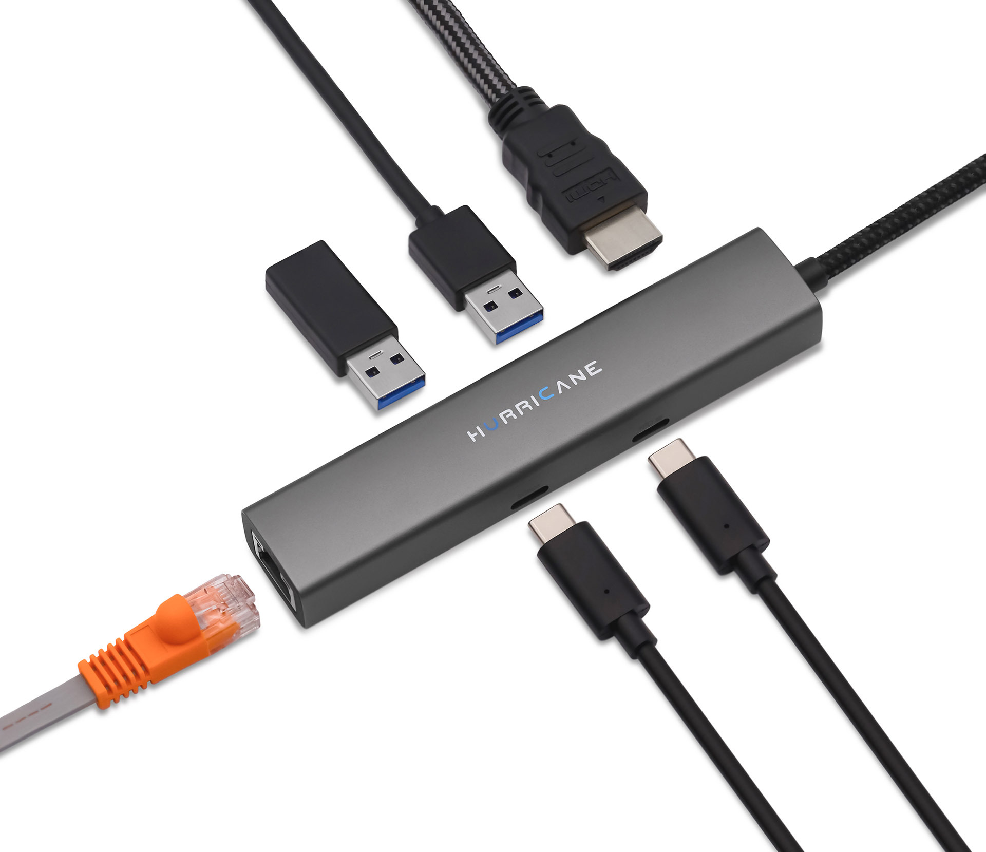 Ein grauer USB-Hub mit mehreren Anschlüssen. Verschiedene Kabeltypen sind an den Hub angeschlossen.