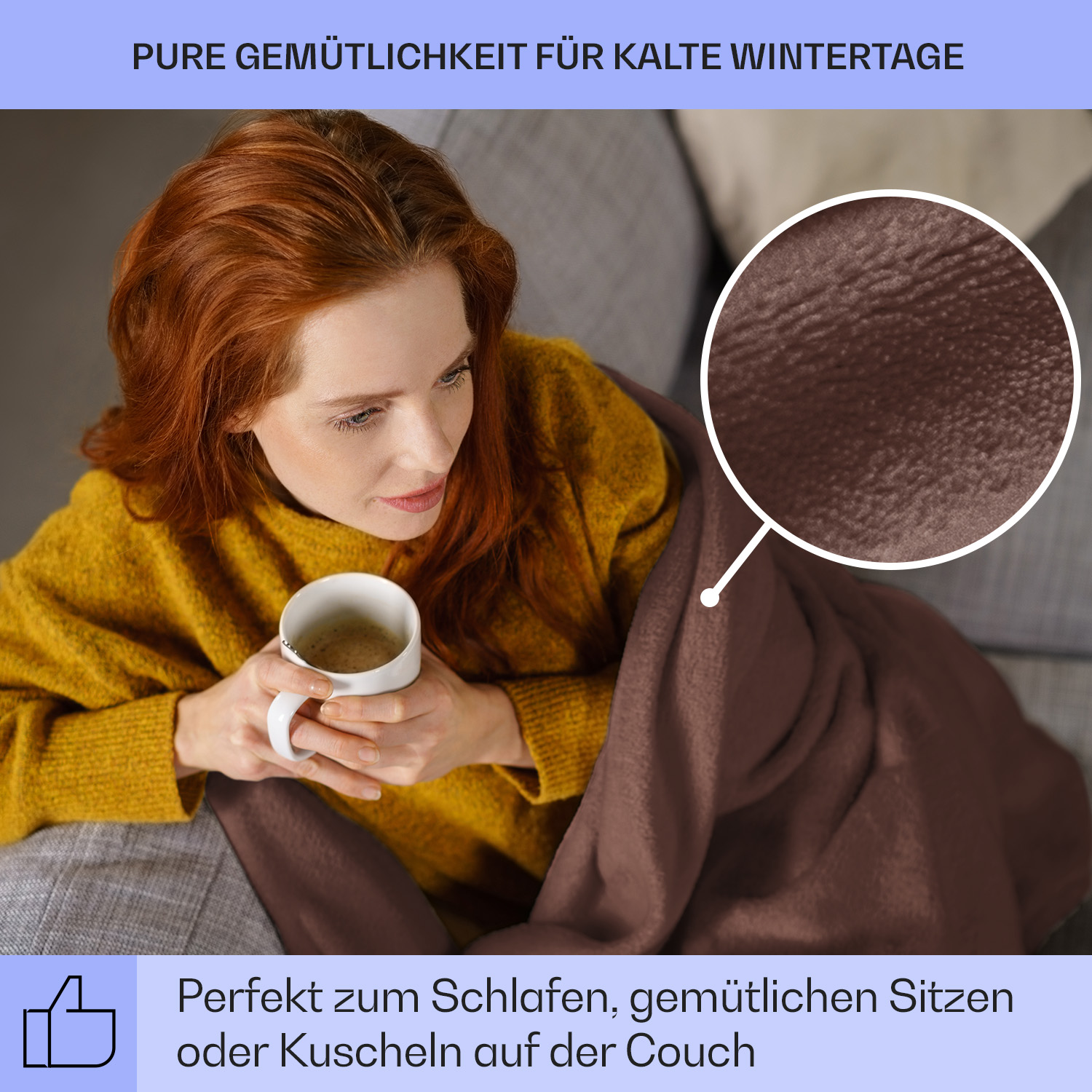 Frau mit roten Haaren, hält einen Becher, bedeckt von einer braunen Decke.