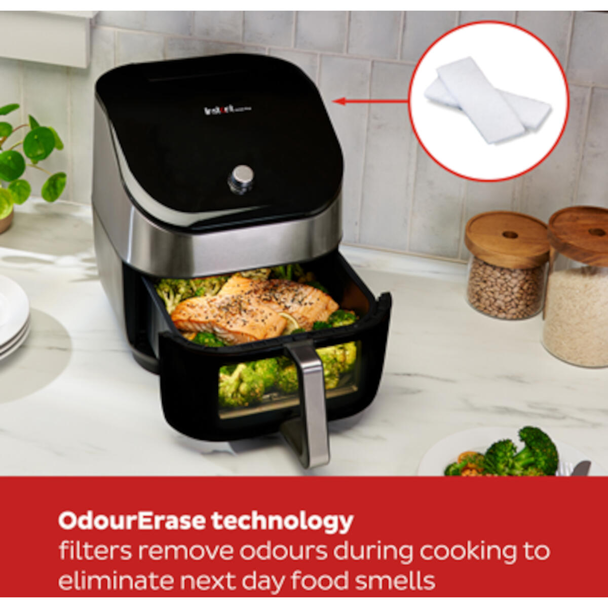 Air fryer with food inside. Two white filters. Text 'OdourErase technology'.