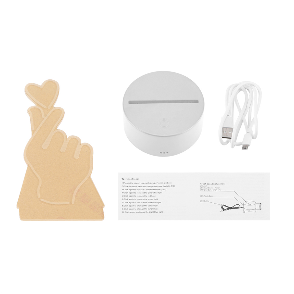 Eine herzförmige Acrylhand formt das koreanische Fingerherz. Ein weißer Sockel und ein USB-Kabel sind ebenfalls vorhanden.