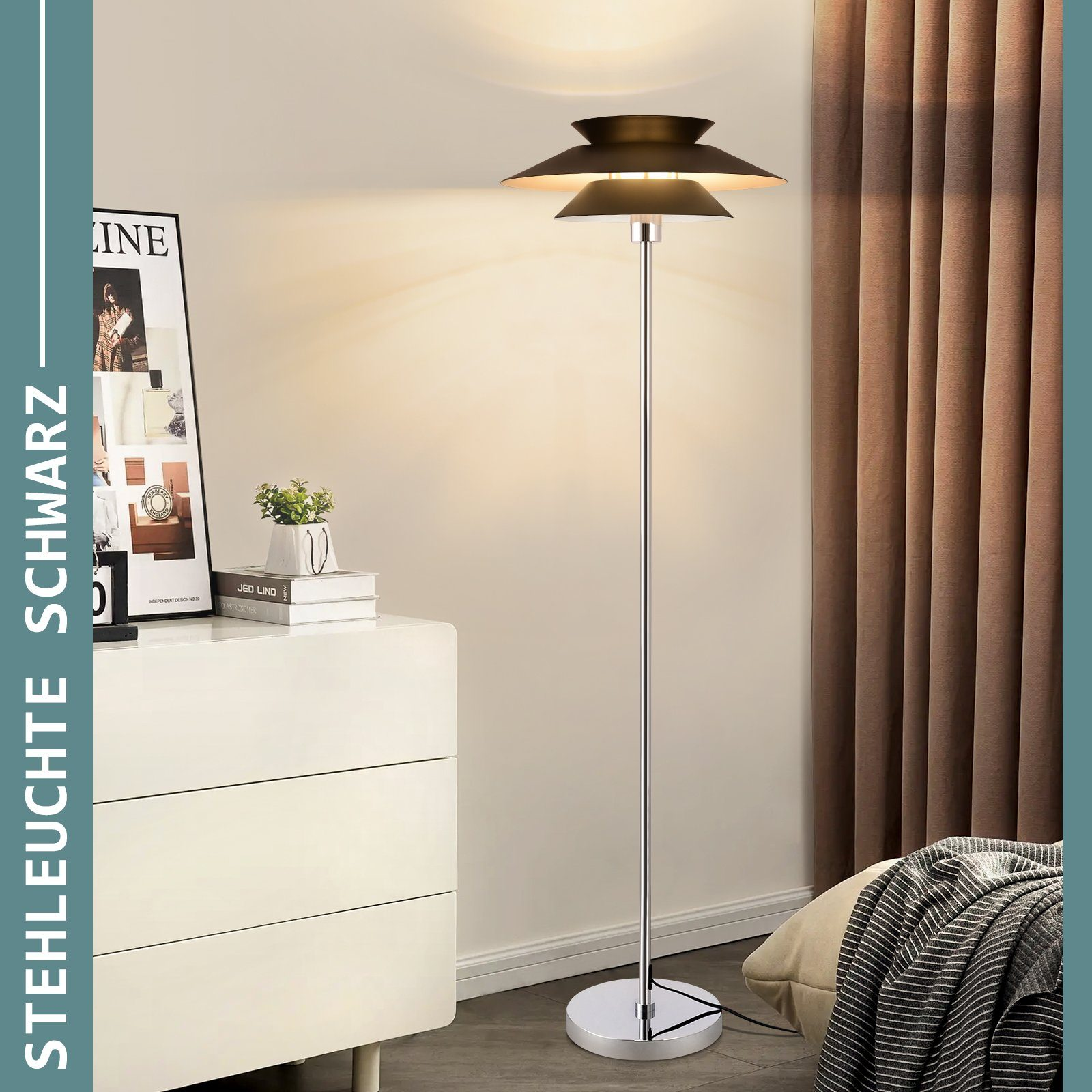 Lampa stojąca z dwoma kloszami, biała szafka, książki, plakat i zasłony.