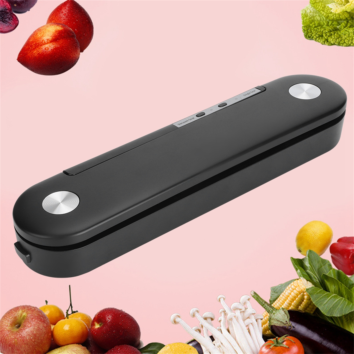 Vakuumierer, schwarz, geschlossen, mit Früchten und Gemüse am Rand.