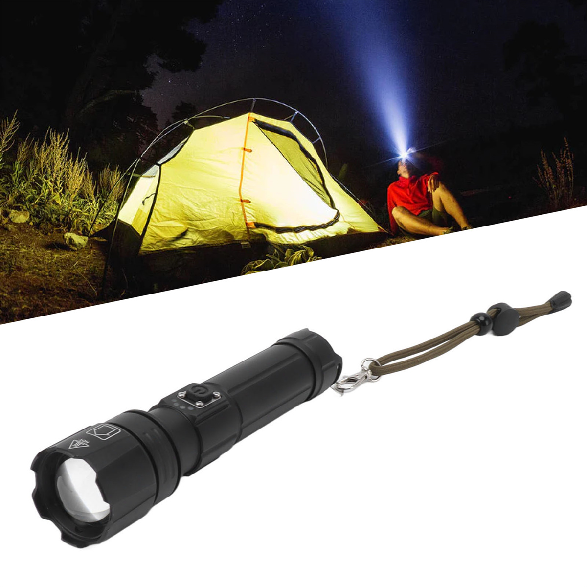 Eine Taschenlampe scheint auf eine Person in einem Zelt bei Nacht. Eine schwarze Taschenlampe mit Riemen.