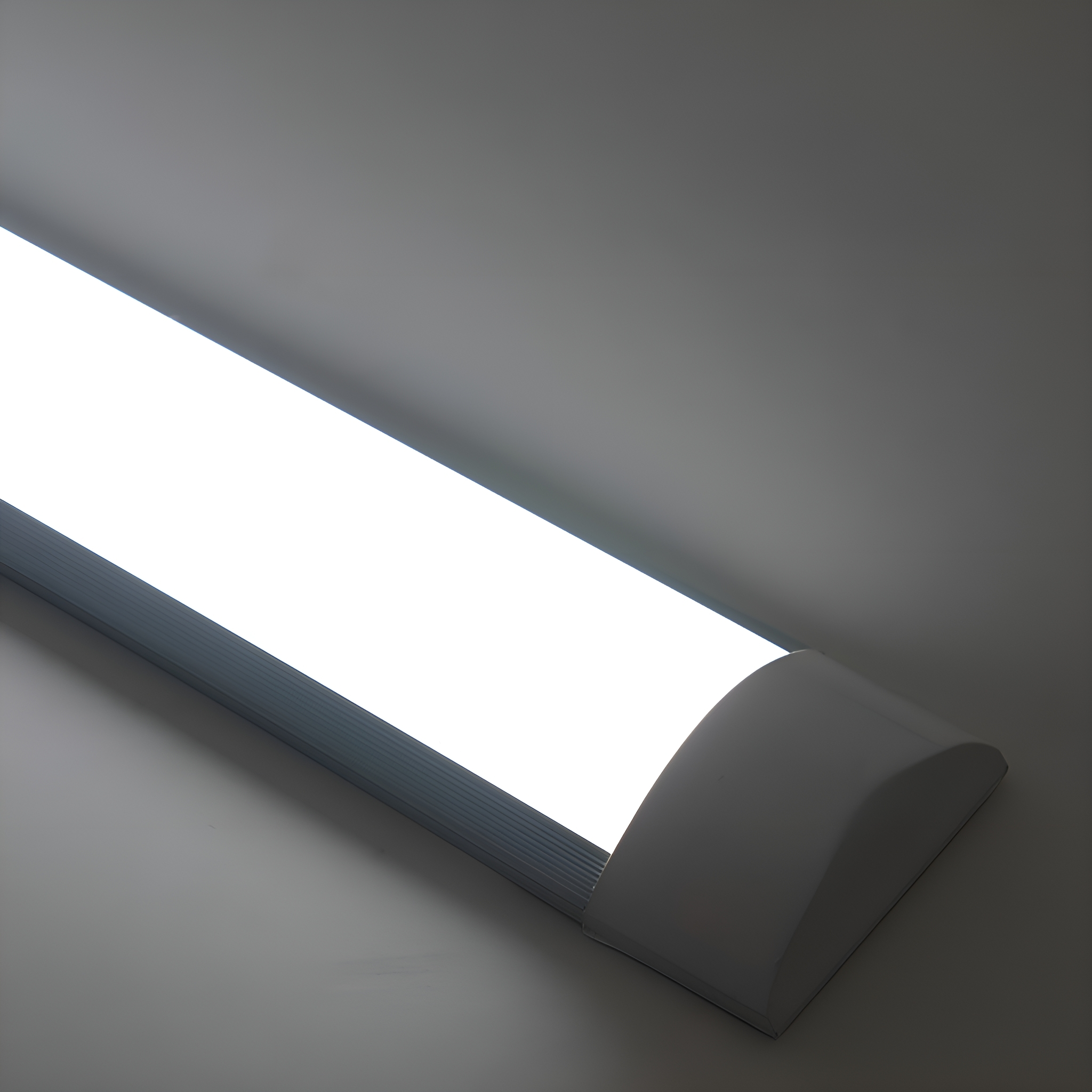 Lange weiße LED-Leuchte auf weißem Hintergrund. Das Licht ist rechteckig.