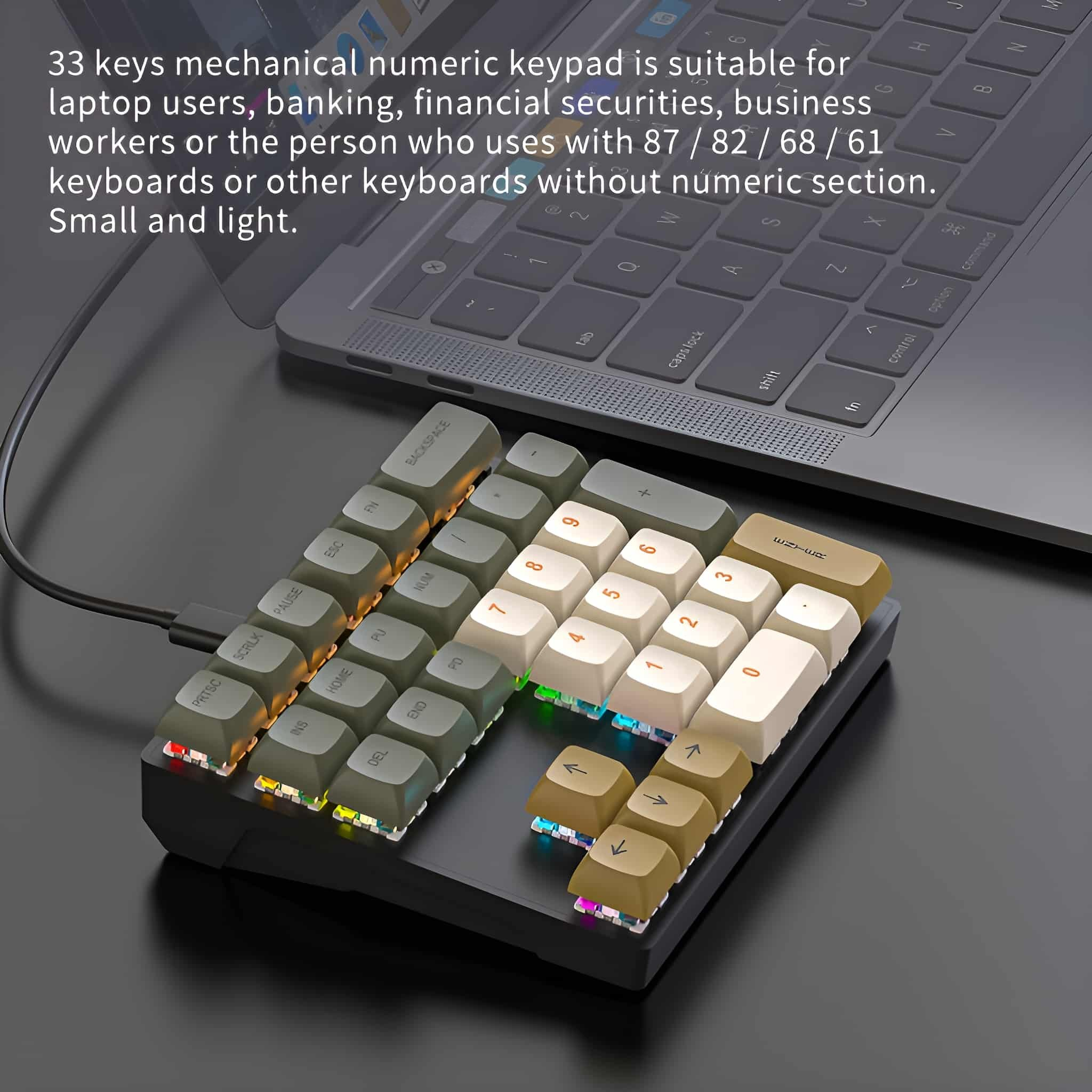 Mechanischer numerischer Ziffernblock mit Lichtern und Tasten, an Laptop angeschlossen.