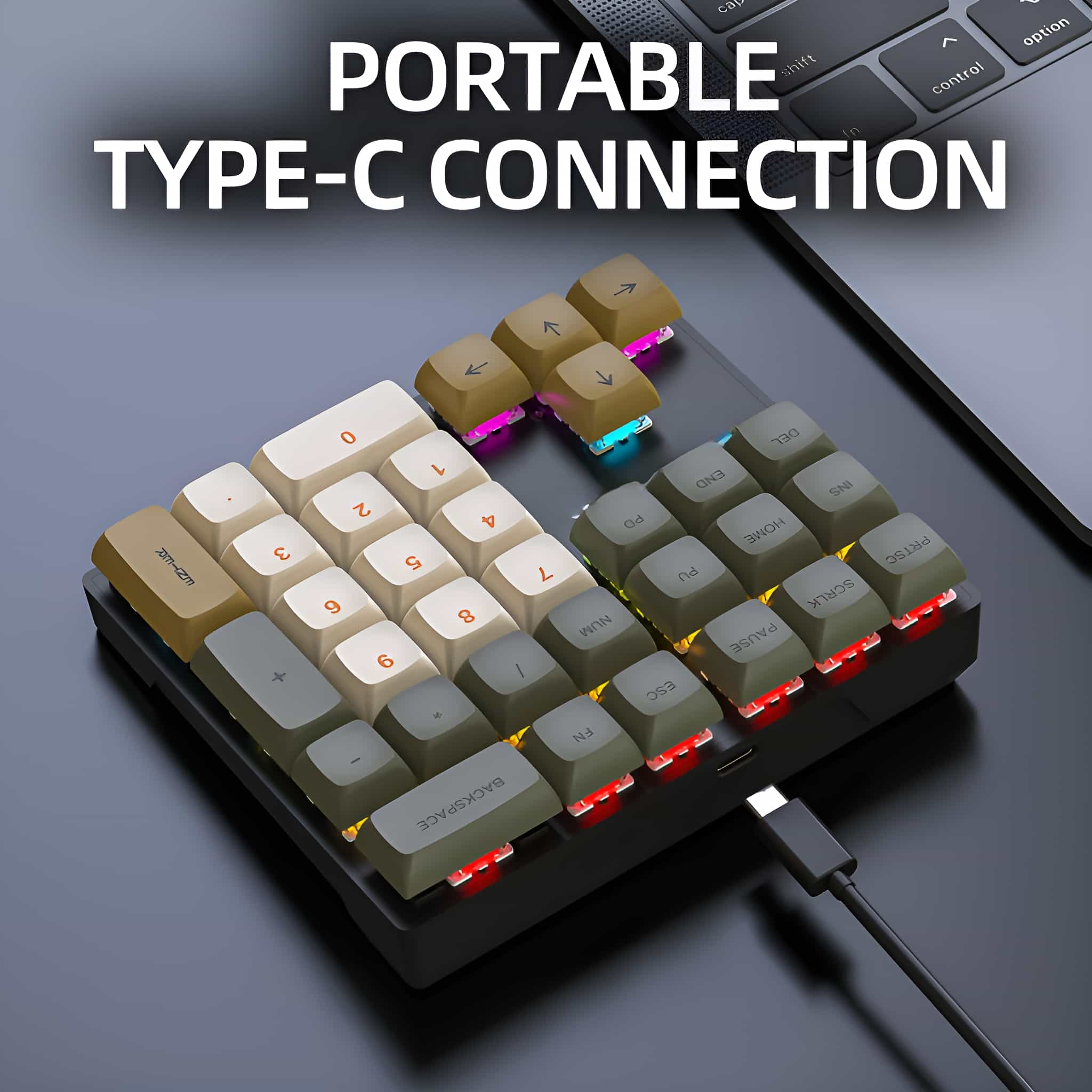 Eine tragbare Tastatur mit USB-C-Kabel, bunten Tasten und einem Laptop.