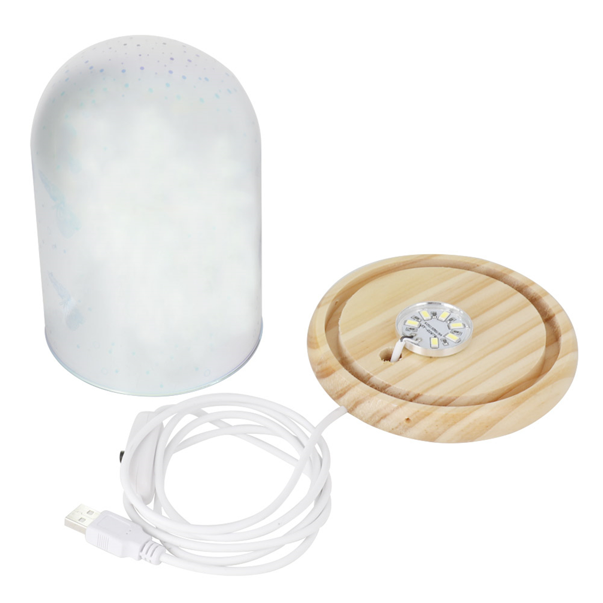 Eine Sternprojektorlampe mit Holzsockel und angeschlossenem USB-Kabel.