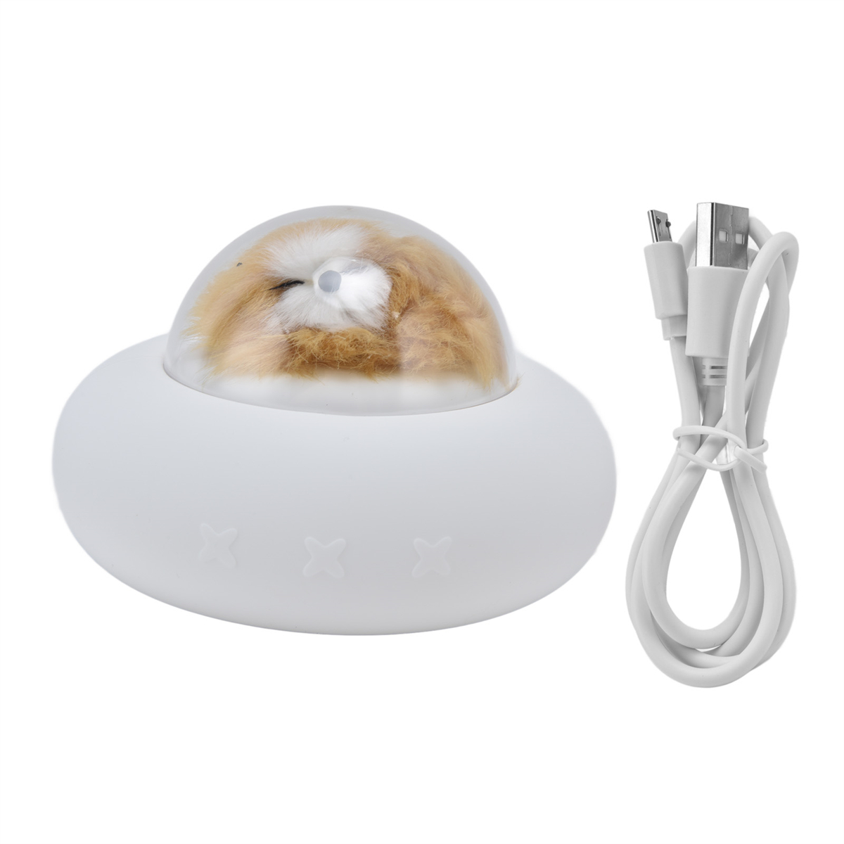 Weißes UFO-förmiges Nachtlicht mit schlafendem Hund in einer durchsichtigen Kuppel. Ein weißes USB-Kabel daneben.
