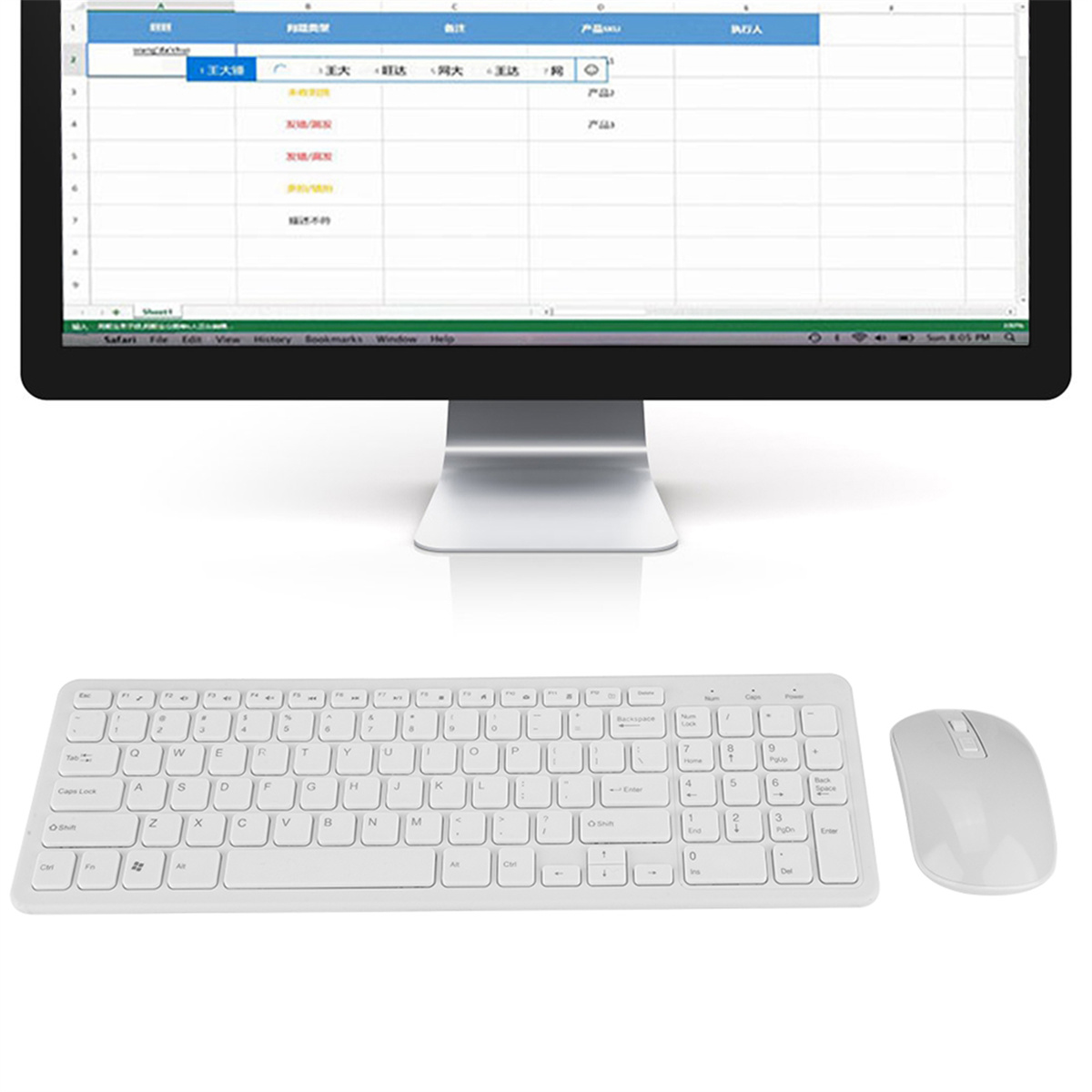 Weißes Computer-Setup mit Tastatur, Maus und Monitor, der eine Tabelle anzeigt.