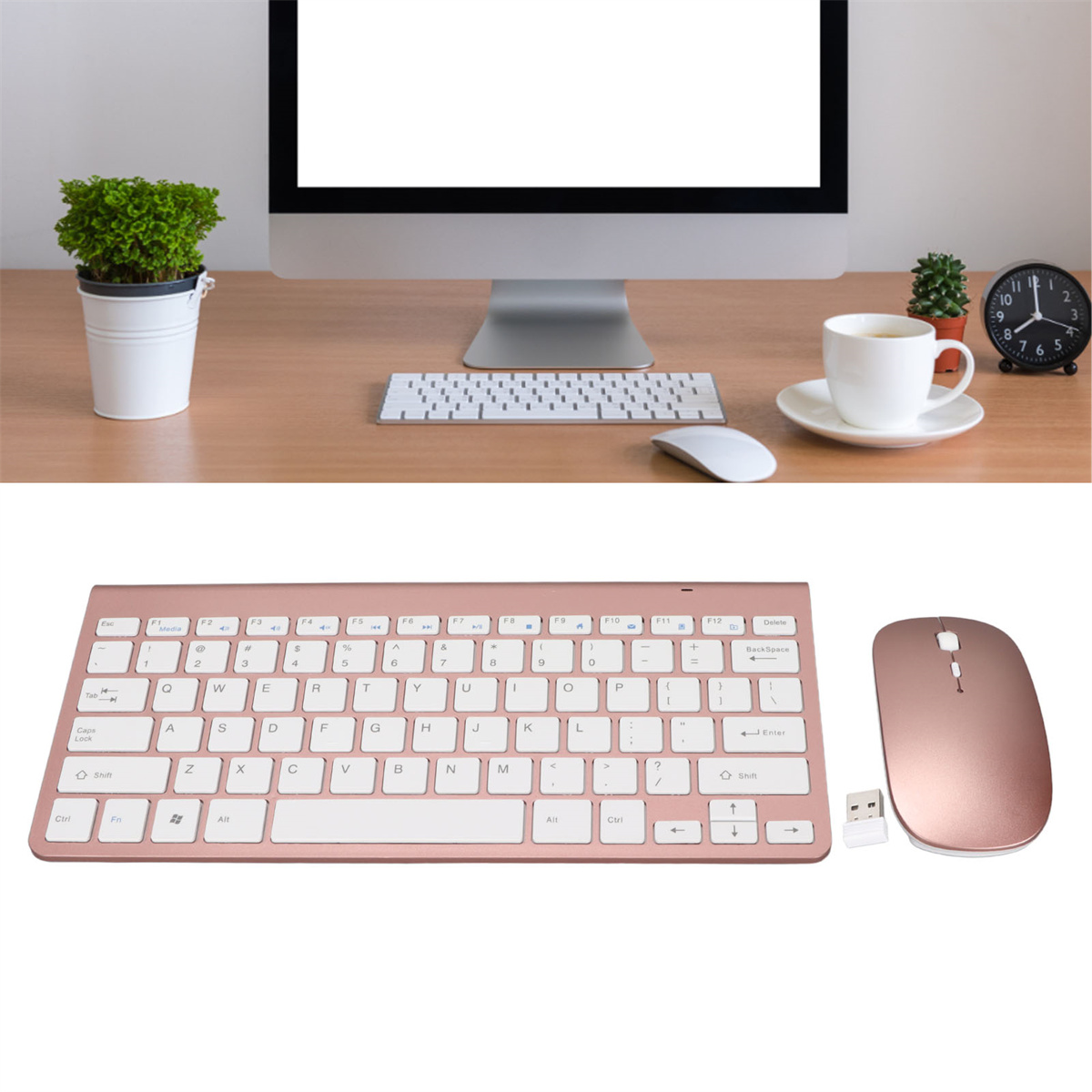 Desktop-Setup: Monitor, Tastatur, Maus, Pflanze, Tasse, Uhr.