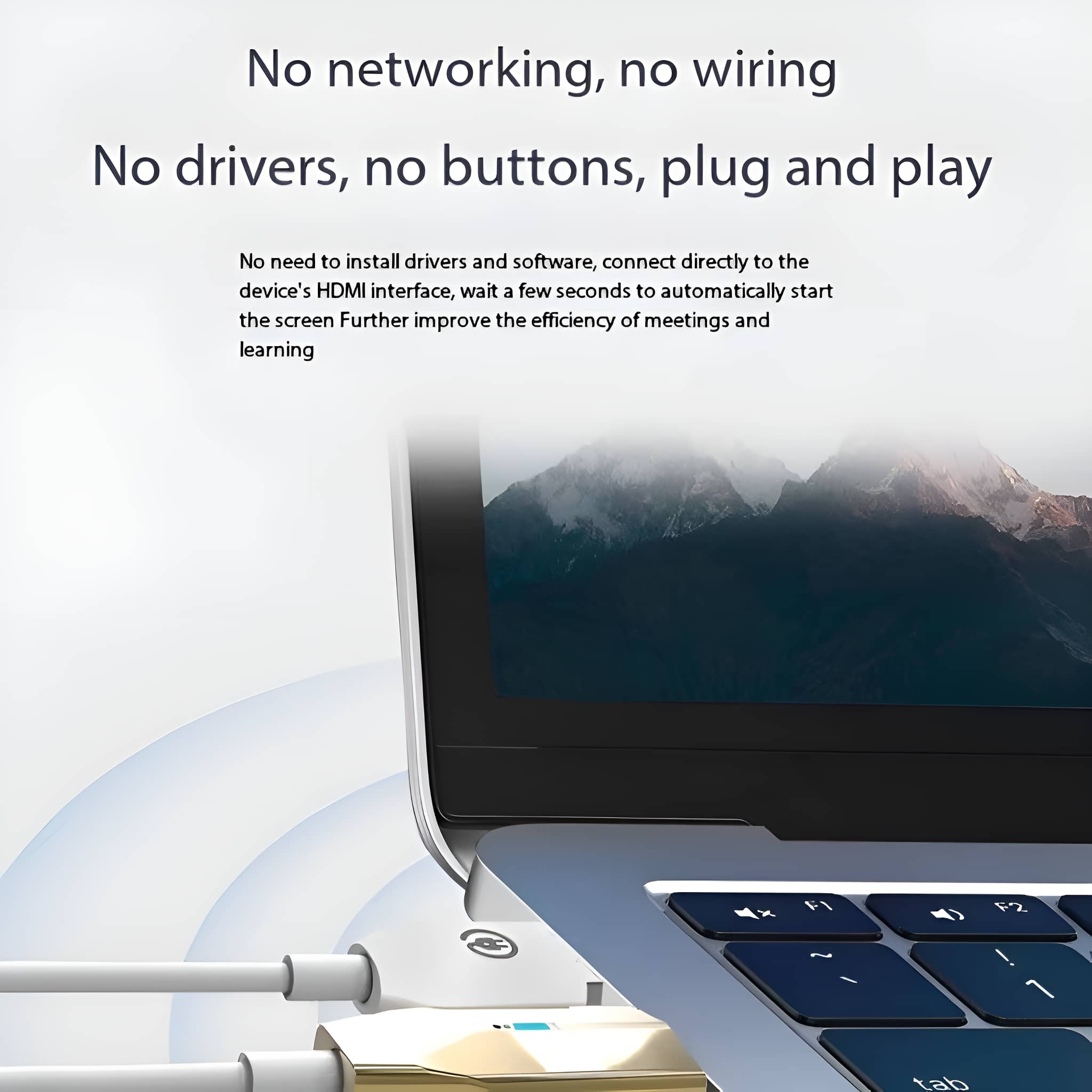Laptop-Tastatur und ein angeschlossenes HDMI-Kabel. Text: Keine Vernetzung, keine Verkabelung. Keine Treiber, keine Tasten, Plug and Play.