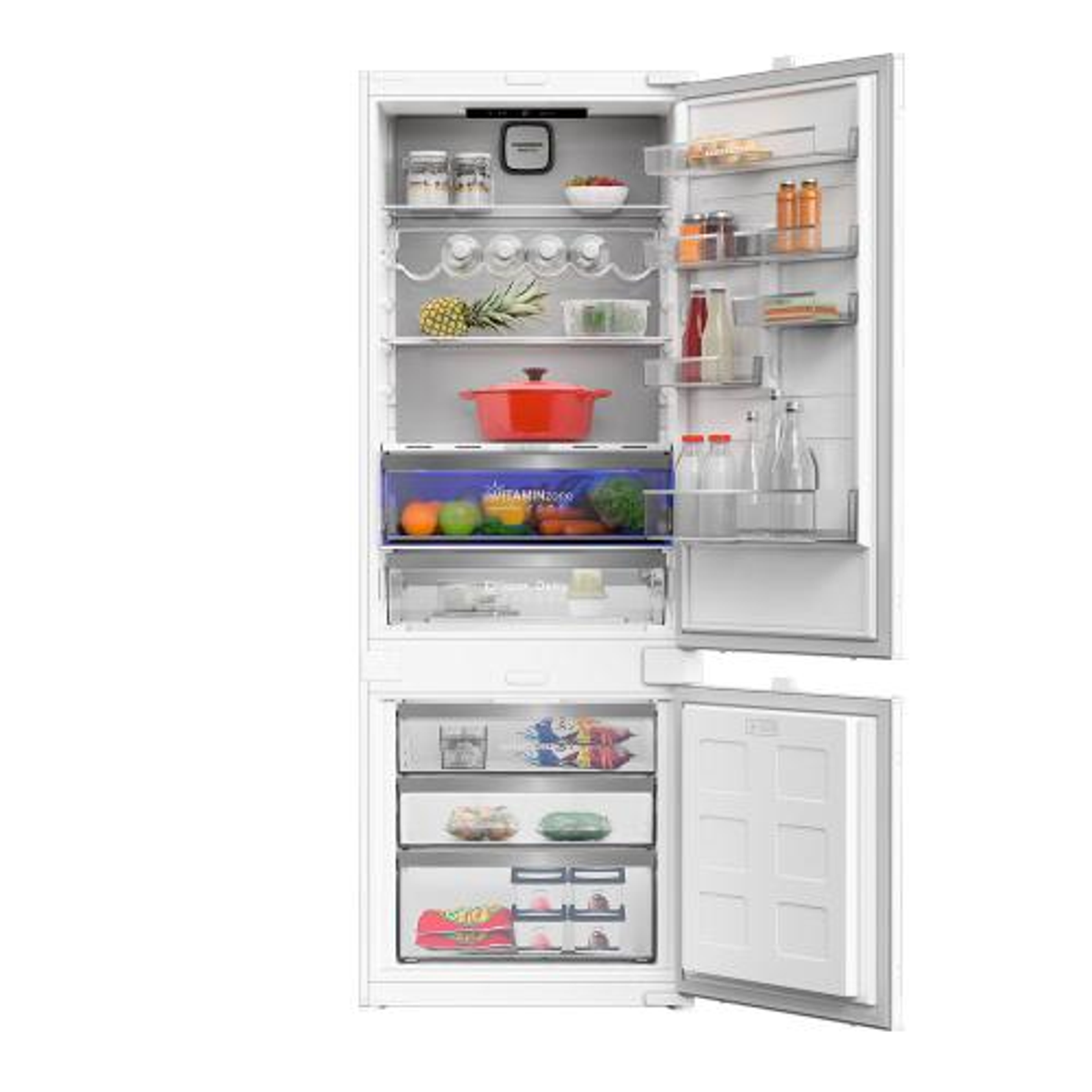 Un refrigerador blanco con la puerta abierta, lleno de comida y estantes.