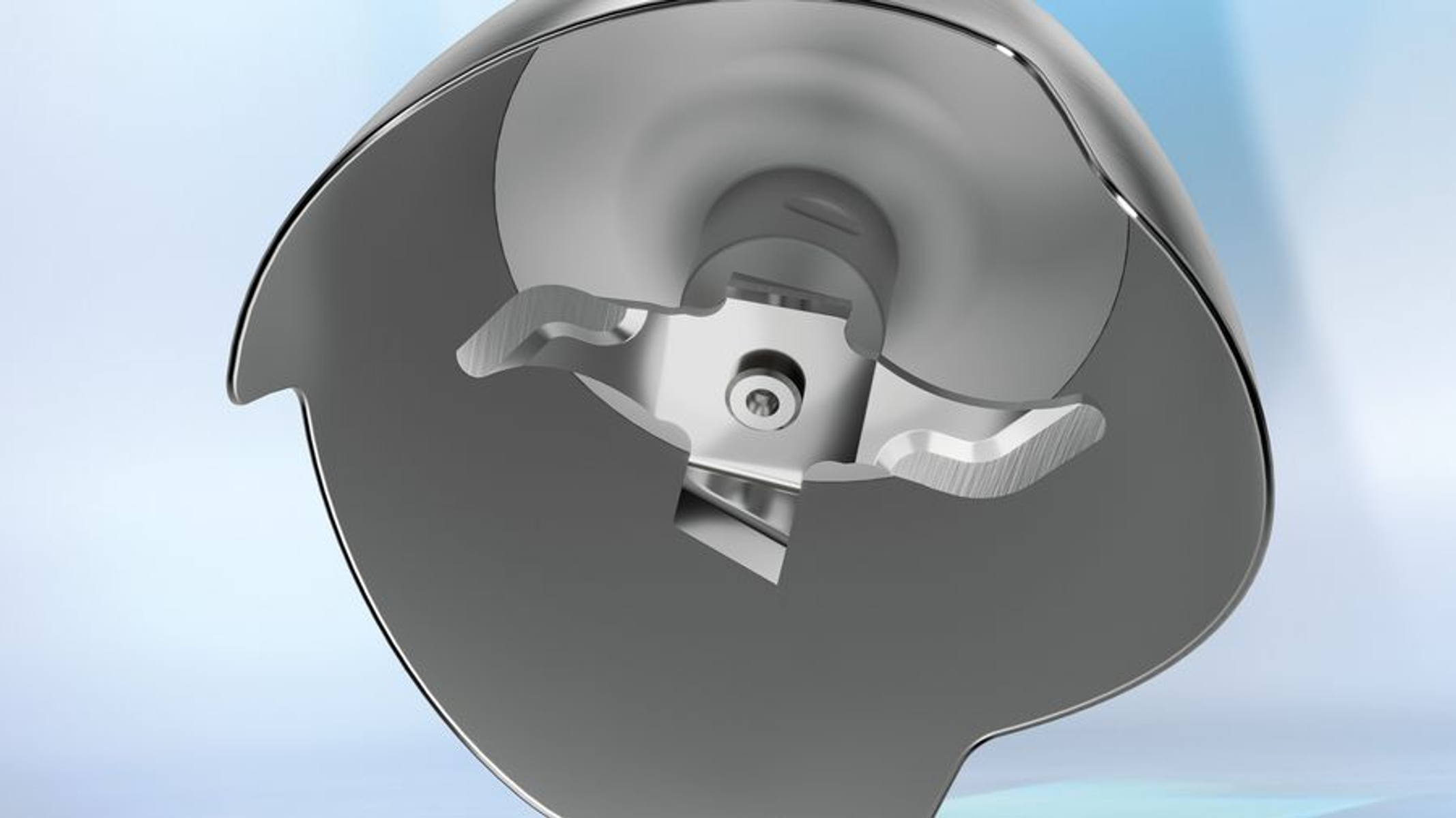 Zbliżenie ostrzy blendera. Ostrza są metalowe i mają ostre krawędzie.