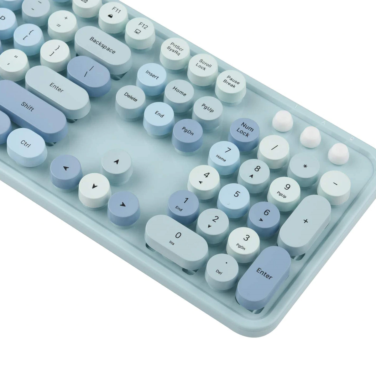Eine hellblaue Tastatur mit runden, pastellfarbenen Tasten. Die Tasten sind weiß und blau.