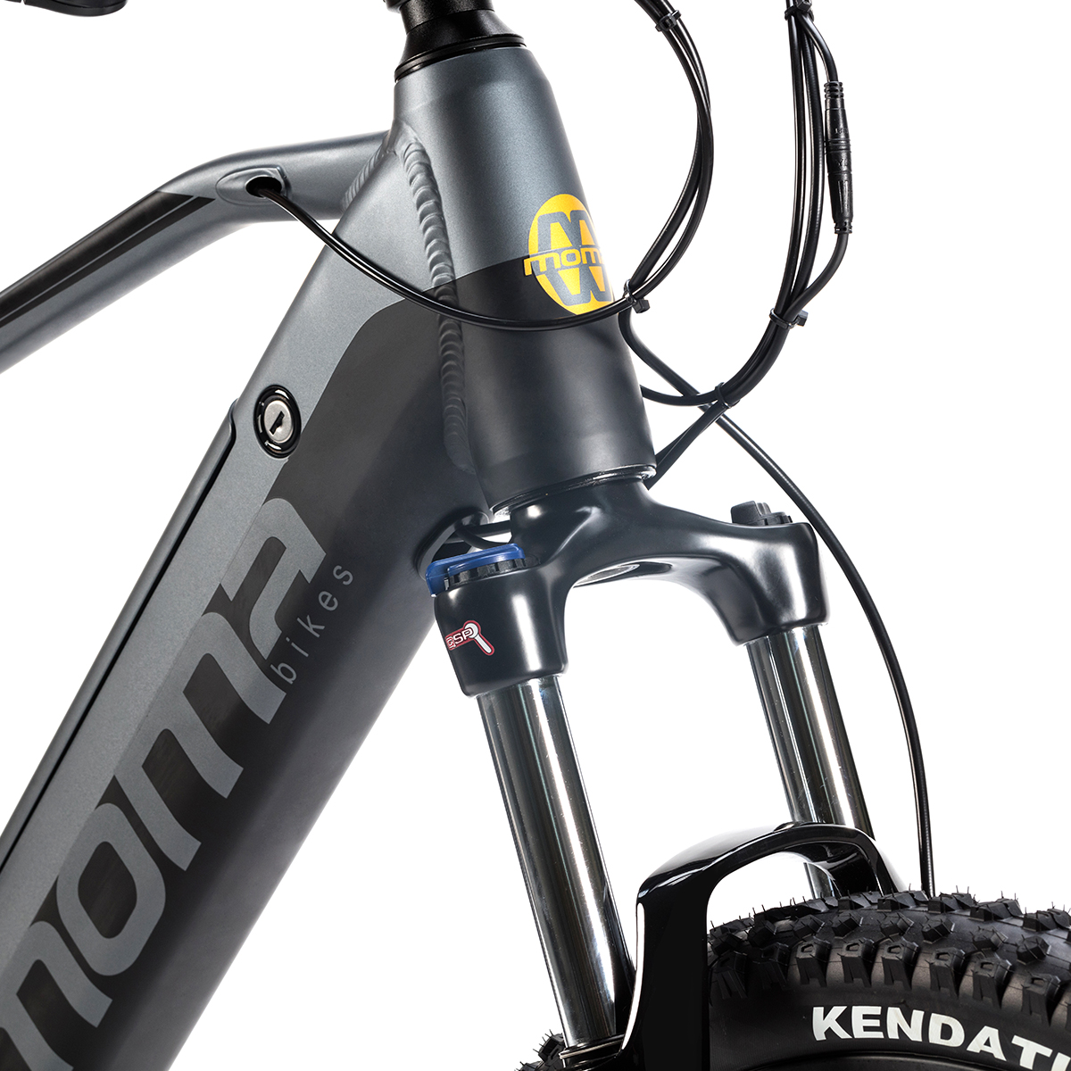 Ein grauer und schwarzer Mountainbike-Rahmen mit dem Namen 'MONTA' an der Seite und einem gelben Logo.