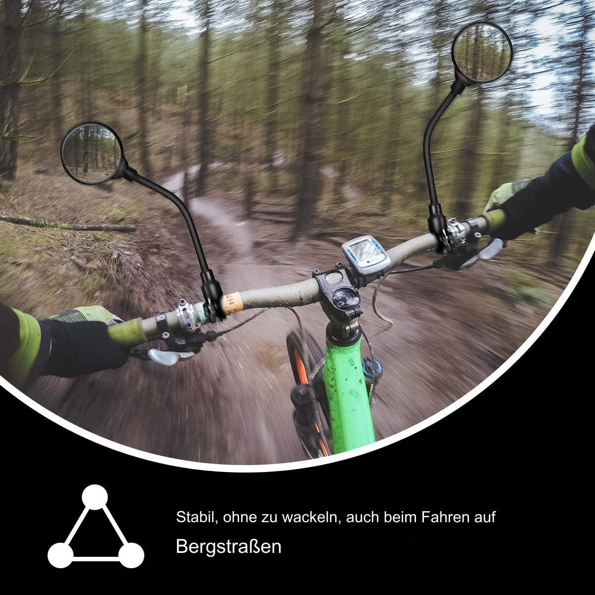 Fahrradlenker mit zwei Rückspiegeln, die durch einen Waldweg fahren.