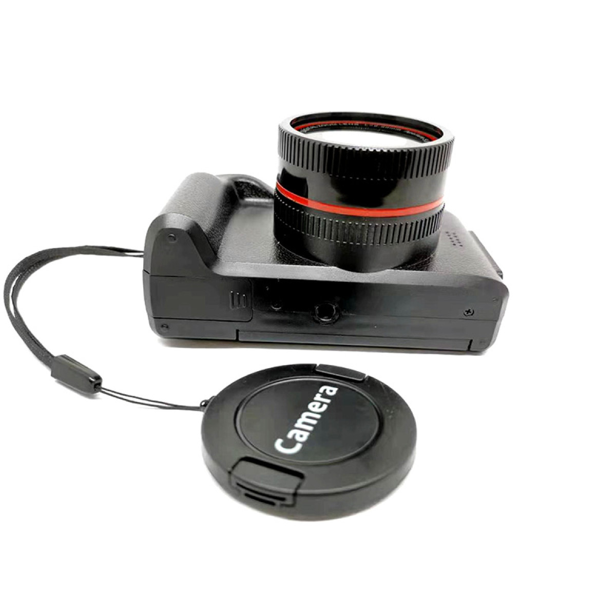 Czarny aparat z obiektywem i osłoną obiektywu. Aparat znajduje się na białej powierzchni.