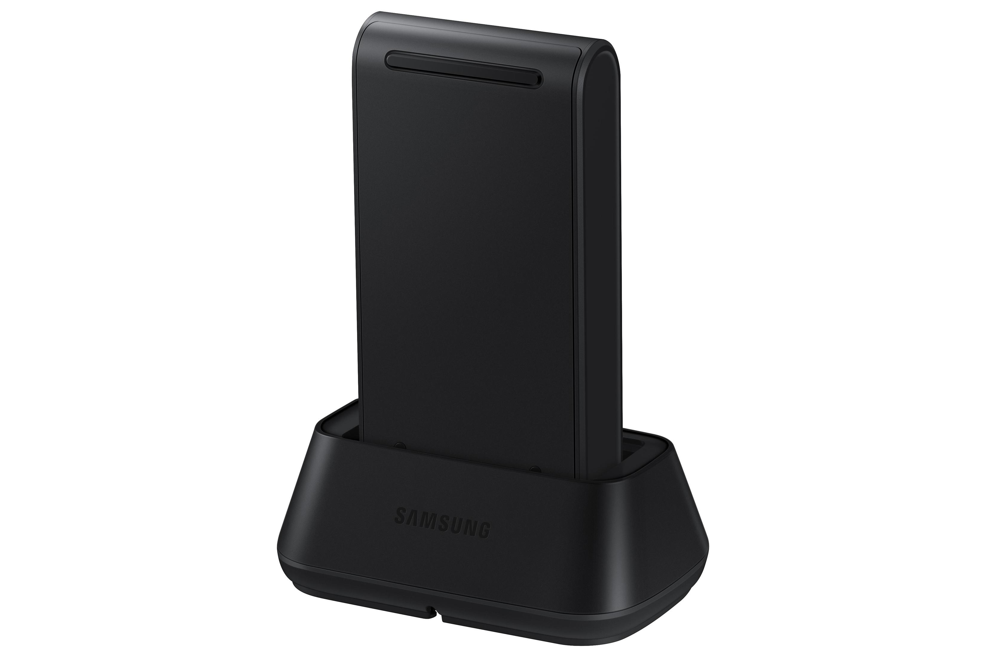 Eine schwarze Samsung-Dockingstation mit einem schwarzen Gerät. Die Basis hat das Samsung-Logo.