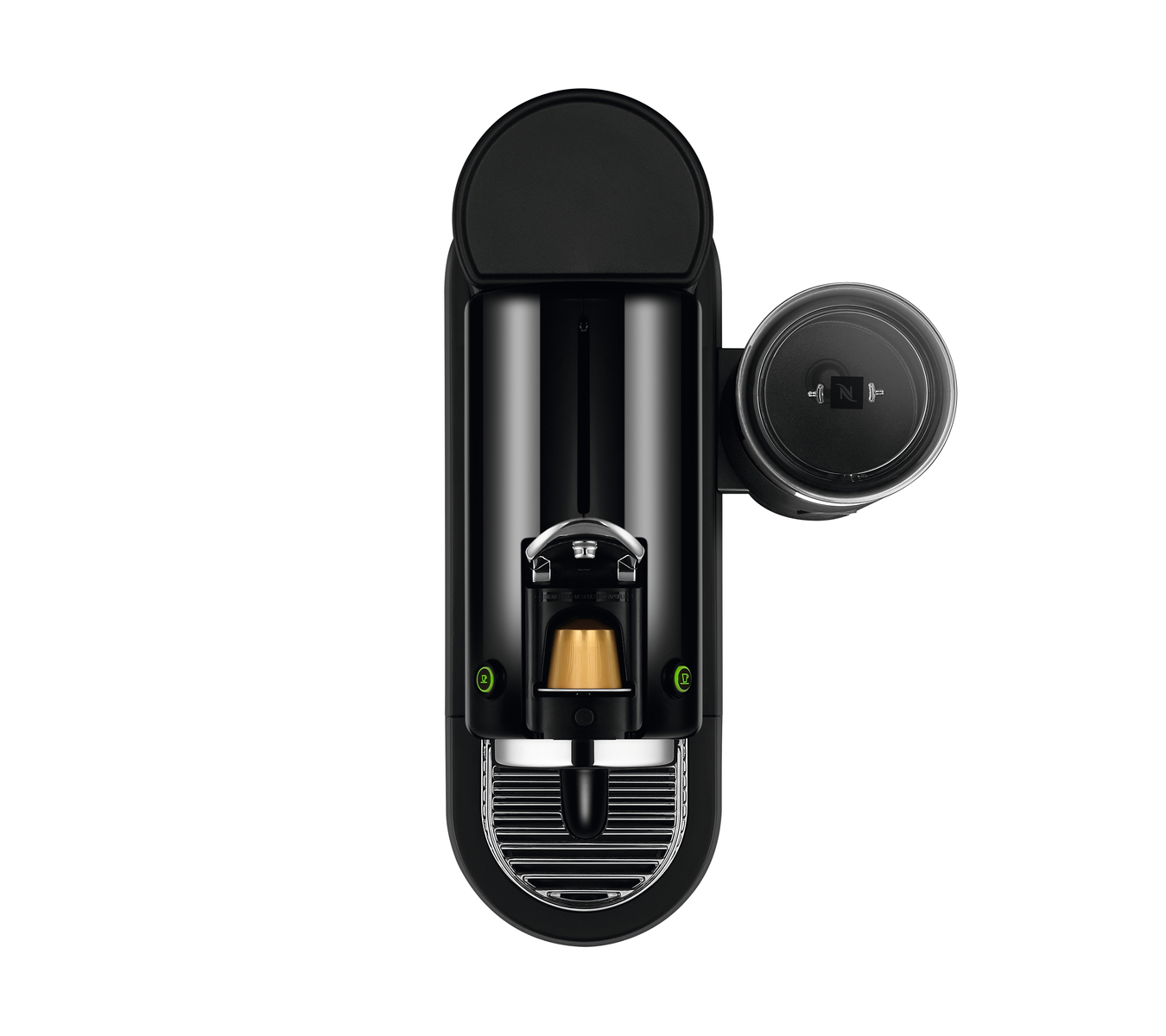 Czarny ekspres do kawy Nespresso z góry. Otwarta pokrywa, widać kapsułkę.