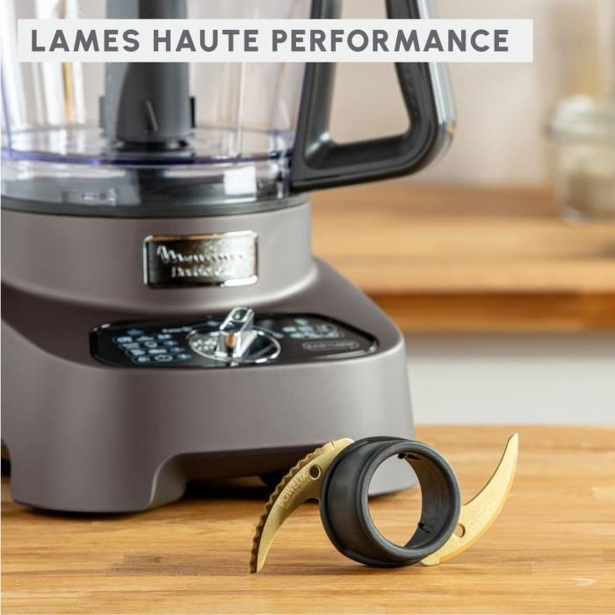 Base de procesador de alimentos con cuchillas, una separada. Dice "LAMES HAUTE PERFORMANCE".