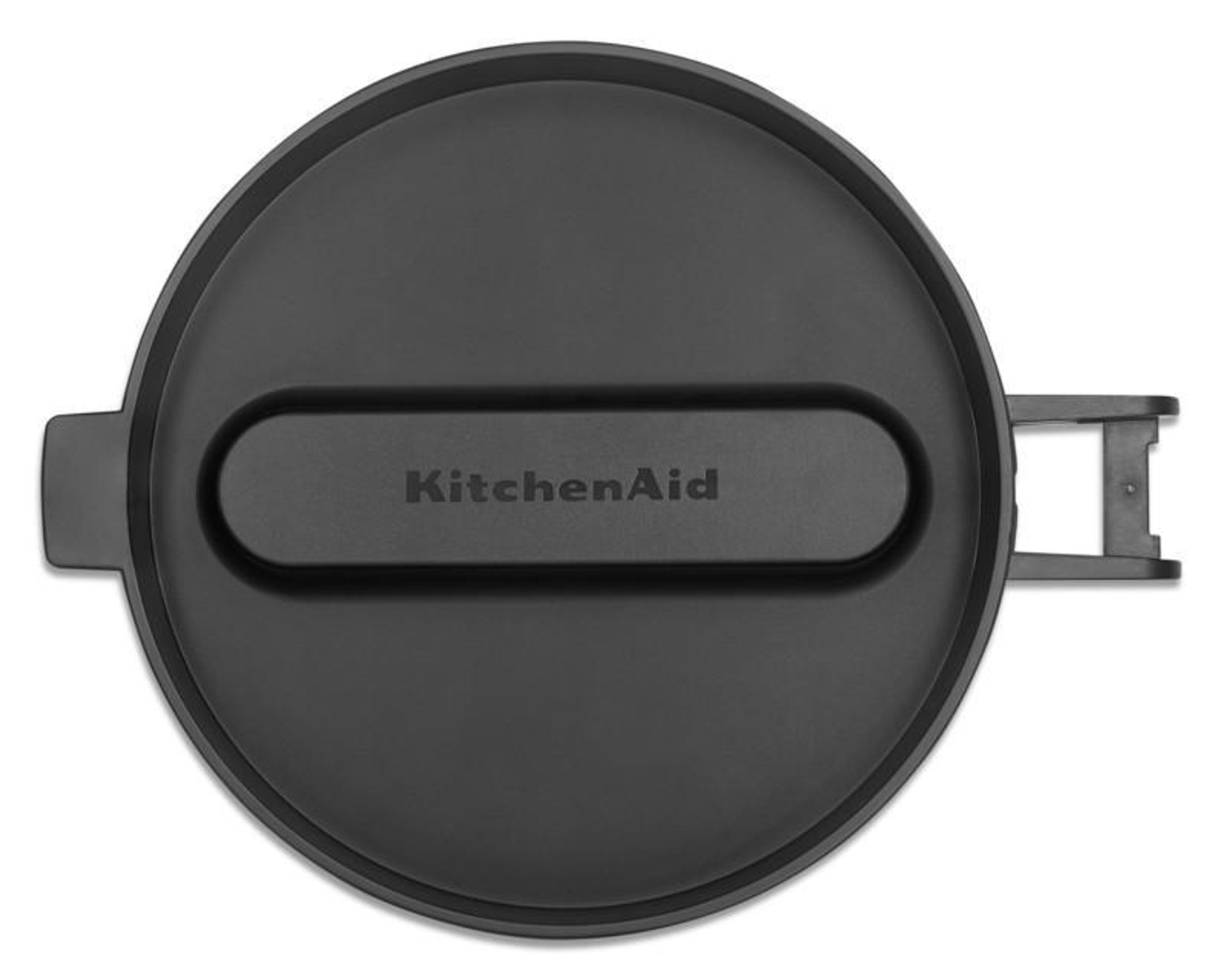 Siyah bir KitchenAid kapa ğı, üstten görünüm, logo hafifçe içe çökük oval bir şekilde.