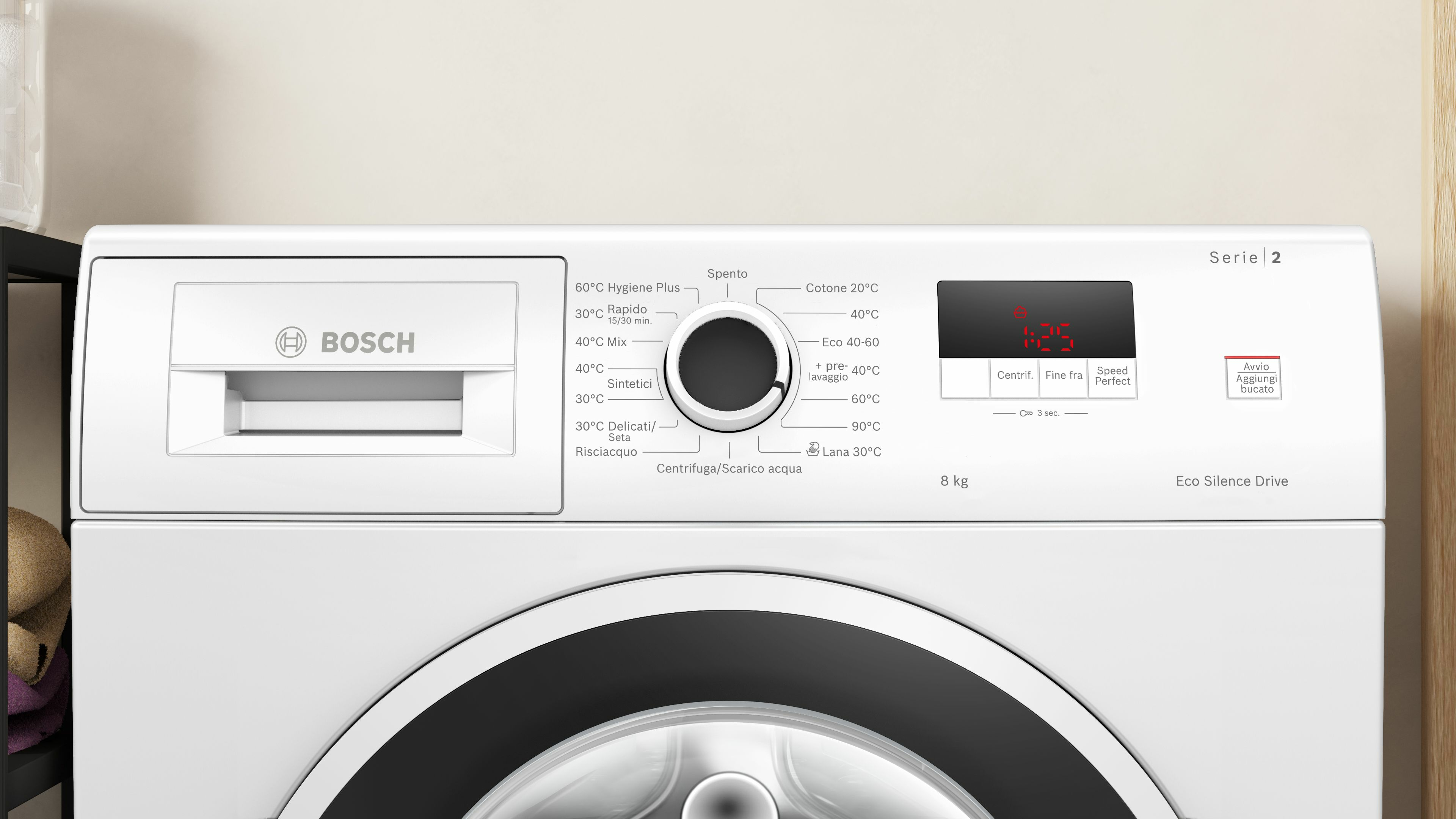 Witte wasmachine met afmetingen. De afmetingen zijn 84,50 cm, 63,20 cm en 59,80 cm.
