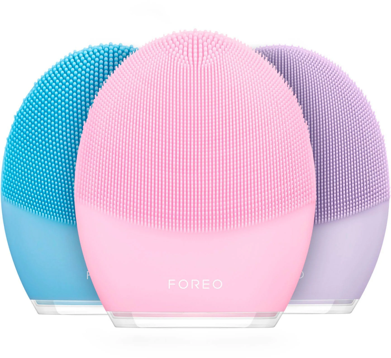 Tres cepillos de limpieza facial Foreo en azul, rosa y morado.