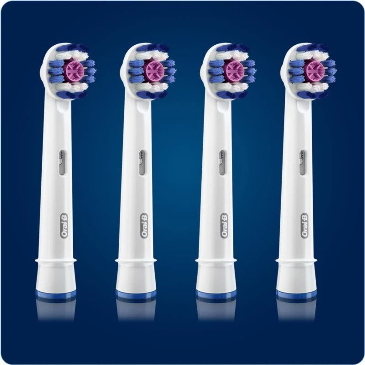 Four Oral-B toothbrush heads, white and blue, with a pink center.