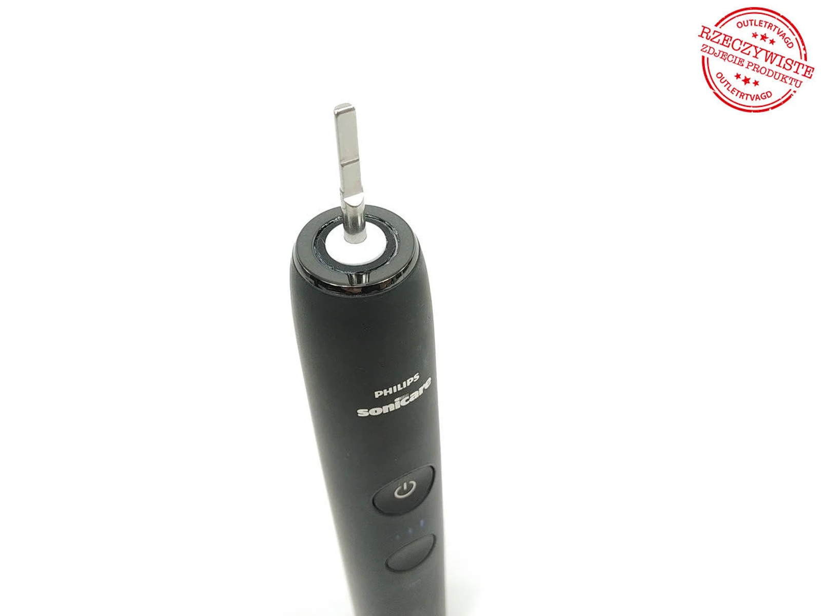 Czarna szczoteczka do zębów Philips Sonicare z zamocowaną główką, na białej powierzchni.
