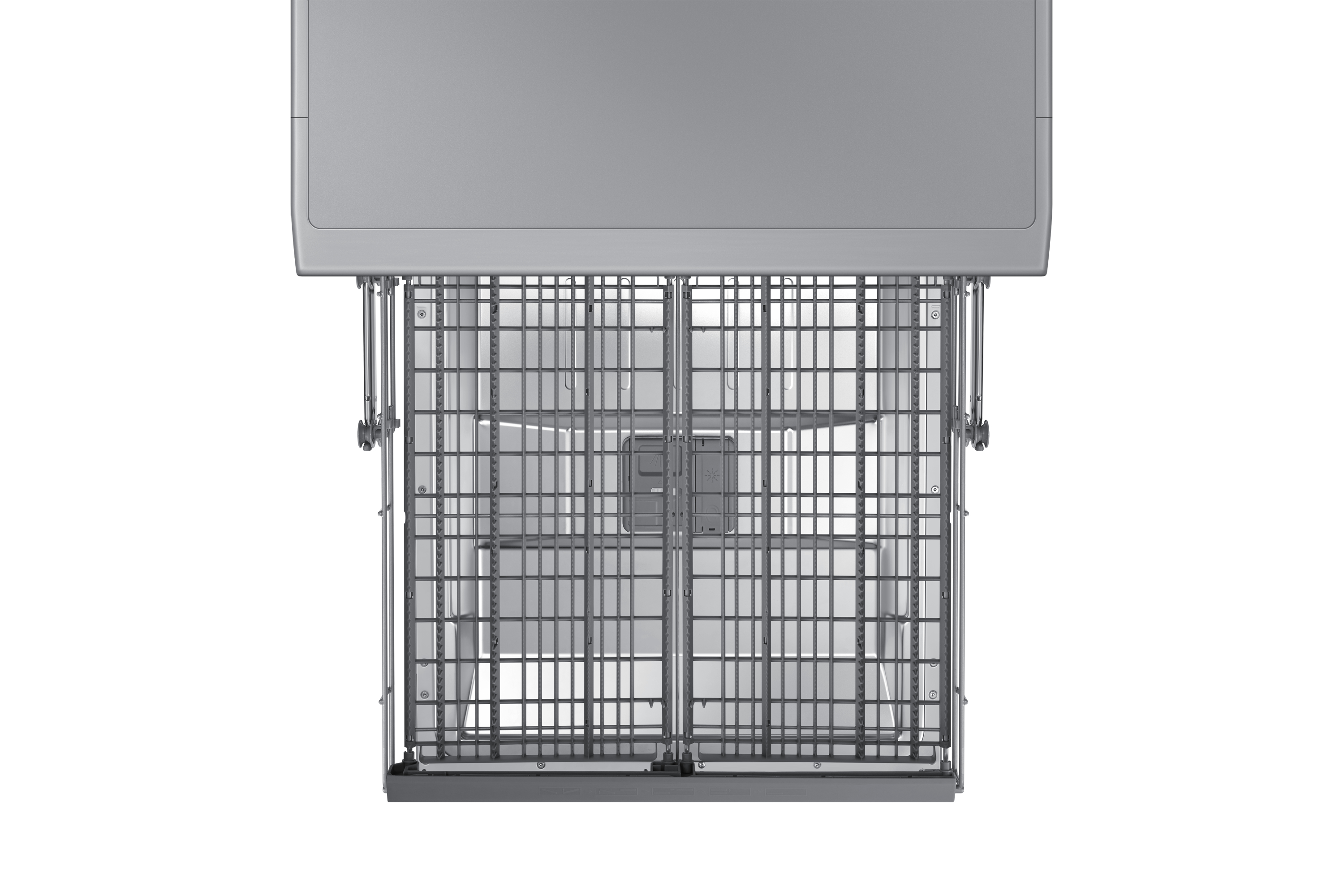 Widok z góry na wnętrze zmywarki. Srebrne stojaki. Białe tło. Pusty od naczyń.