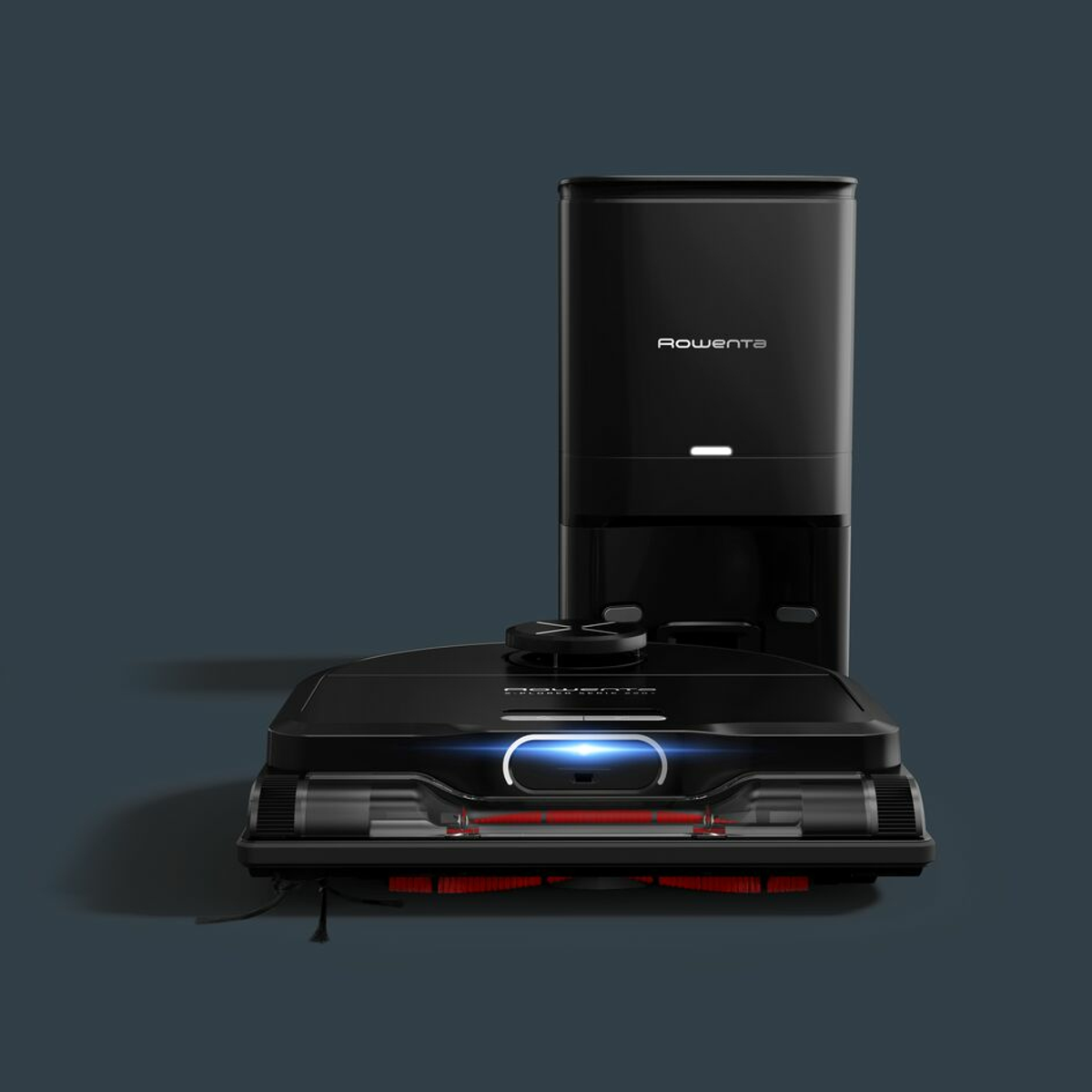 Schwarzer Roboter-Staubsauger und Ladestation, mit Markennamen Rowenta, auf blauem Hintergrund.
