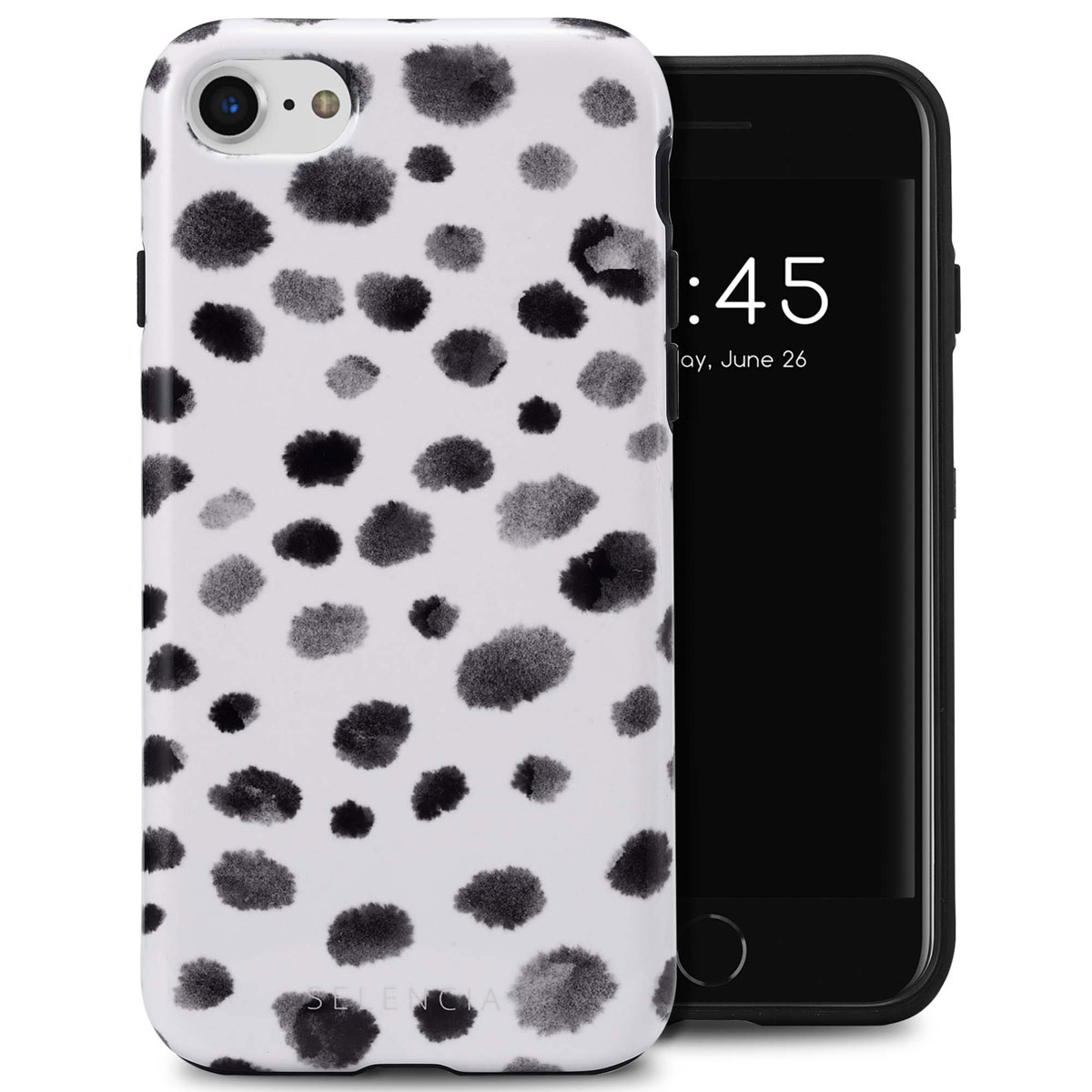 Witte telefoonhoes met zwarte inktvlekken, naast een zwarte telefoon.